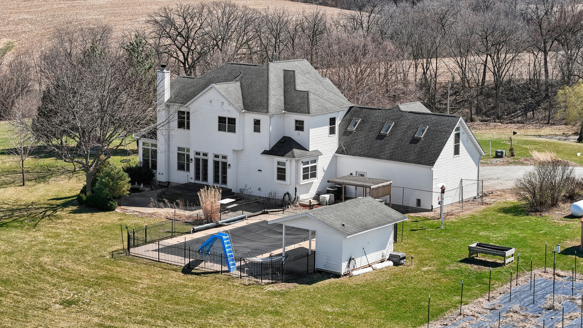 3203 148th Avenue Milan, IL 61264 - Photo 53 of 65 a aerial view of a house with a yard