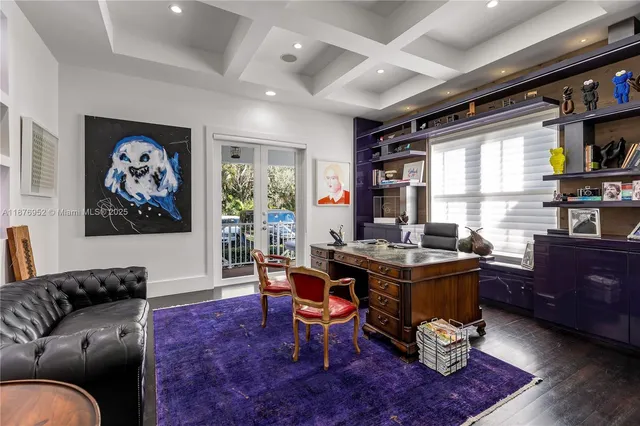 a living room with furniture window and wooden floor