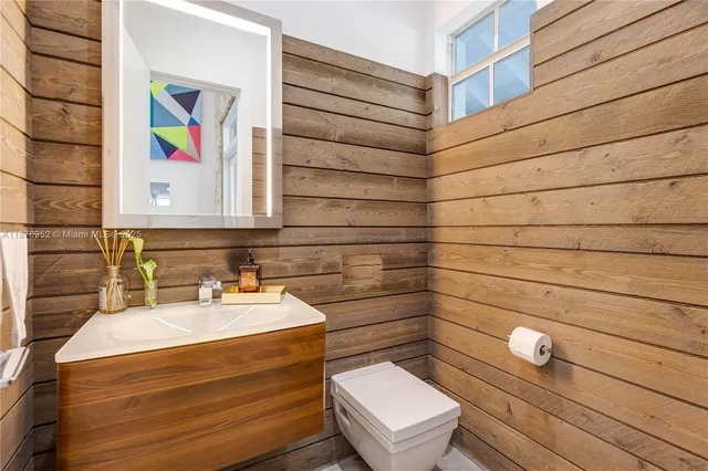 a bathroom with a toilet and a sink