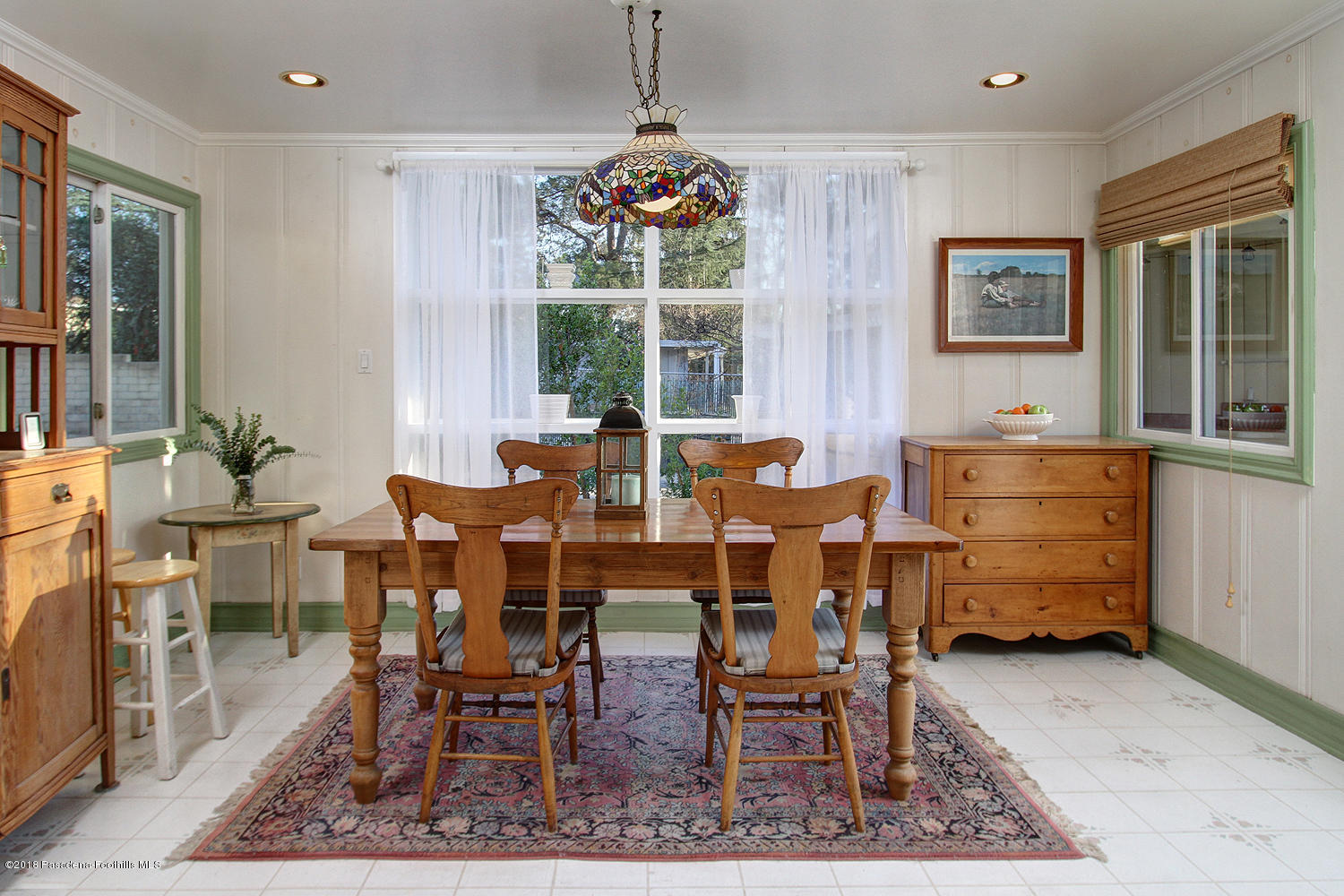 3501 Hollyslope Road Altadena, CA 91001 - Photo 13 of 35 a dining room with furniture and window