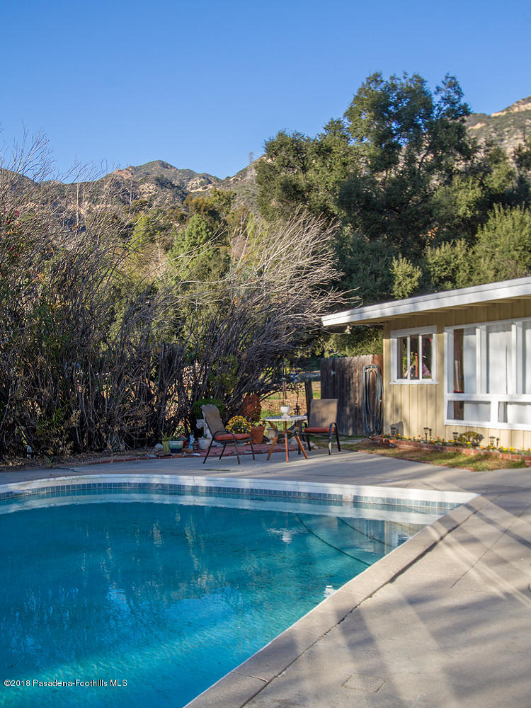 3501 Hollyslope Road Altadena, CA 91001 - Photo 24 of 35 a front view of a house with a yard