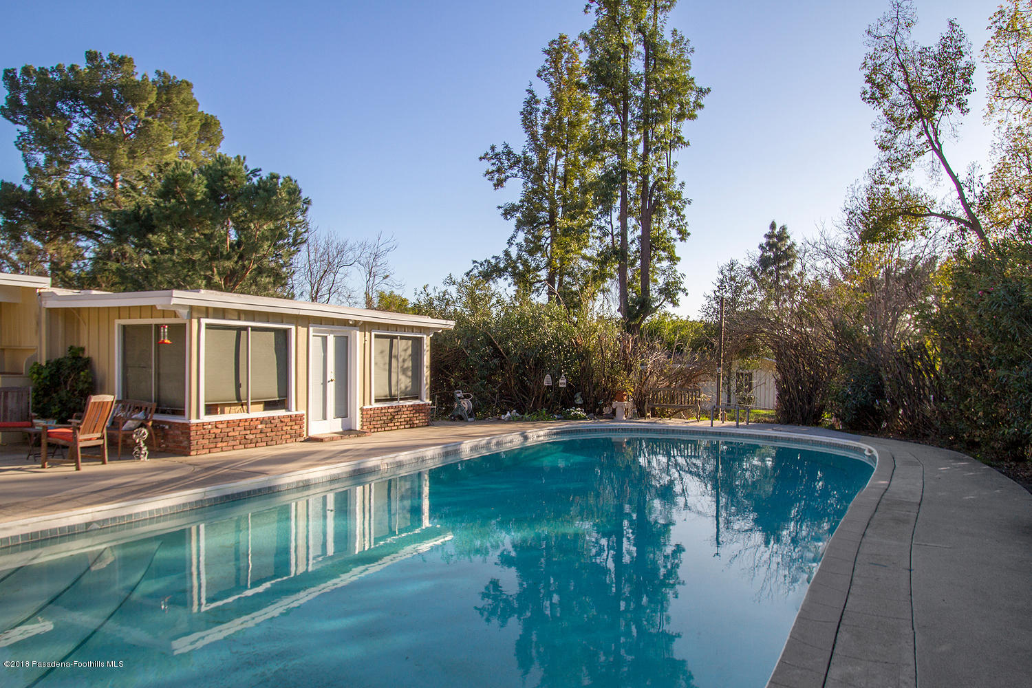 3501 Hollyslope Road Altadena, CA 91001 - Photo 26 of 35 a view of a house with pool and sitting area