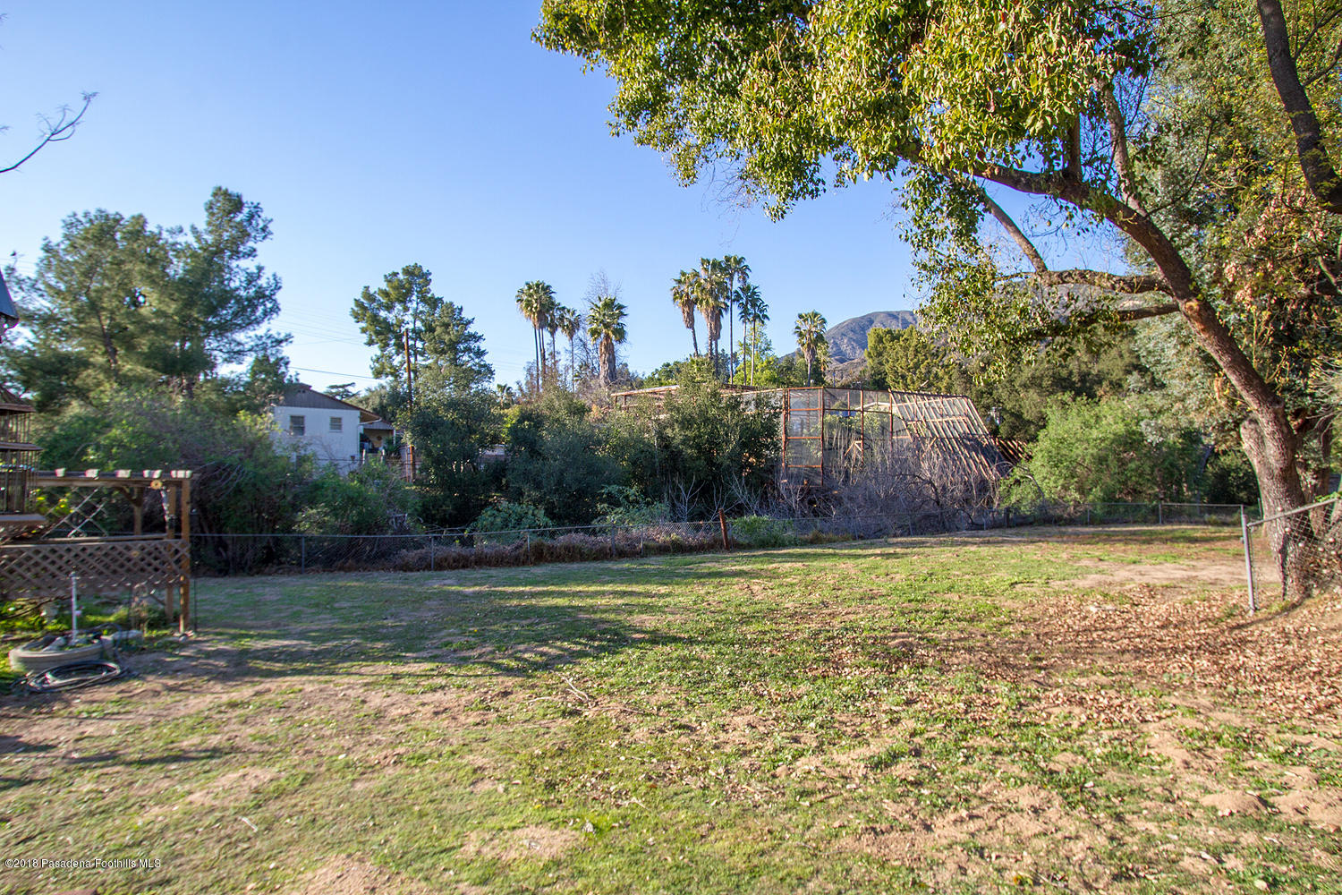 3501 Hollyslope Road Altadena, CA 91001 - Photo 31 of 35 a backyard of a house with lots of green space