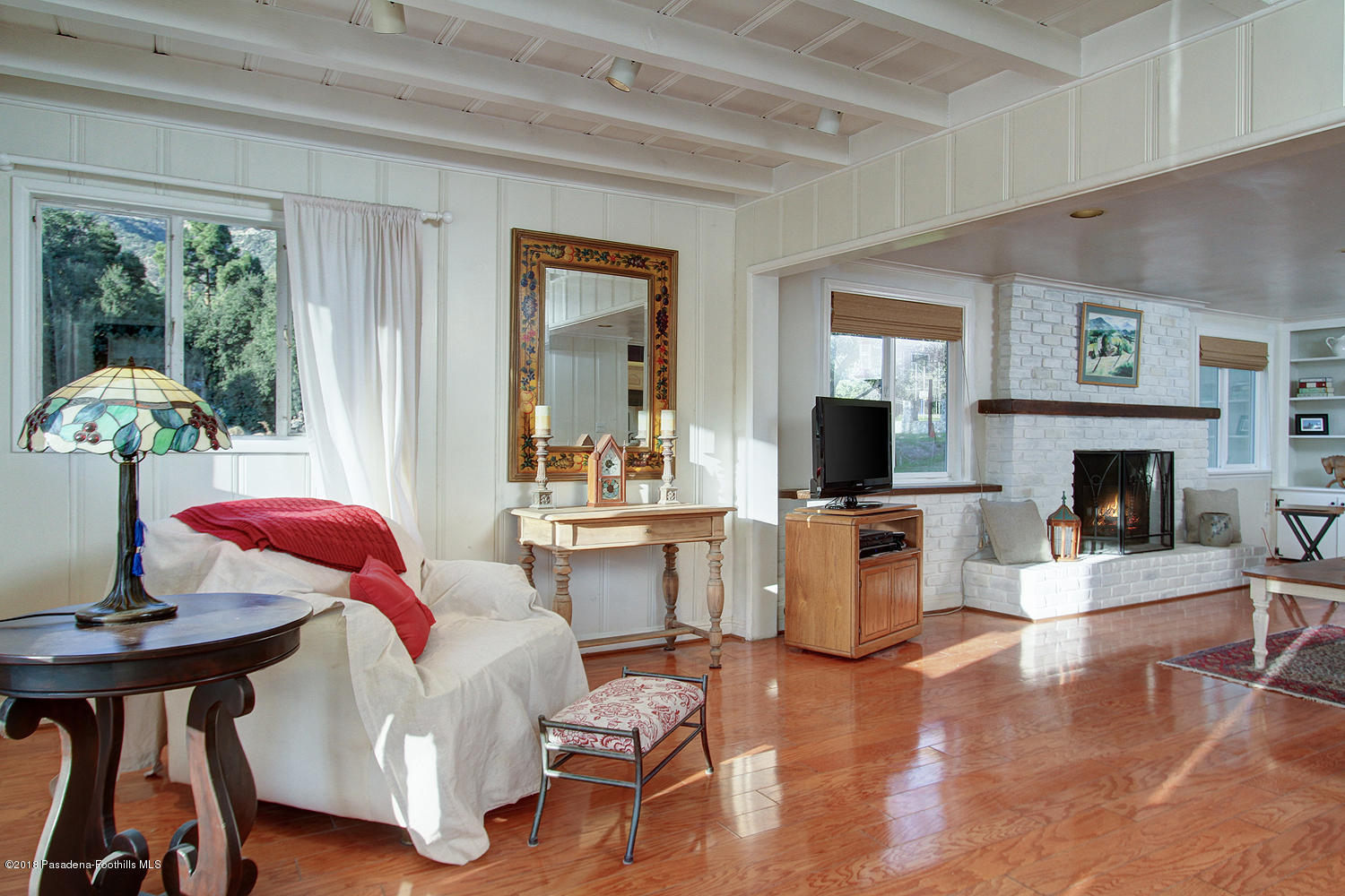 3501 Hollyslope Road Altadena, CA 91001 - Photo 7 of 35 a living room with furniture fireplace and flat screen tv