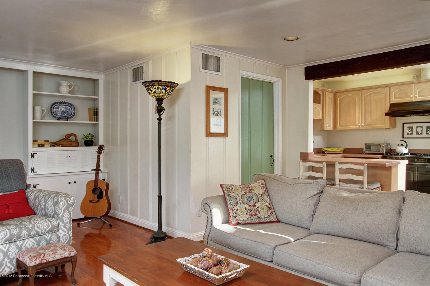 3501 Hollyslope Road Altadena, CA 91001 - Photo 10 of 35 a living room with furniture and a window