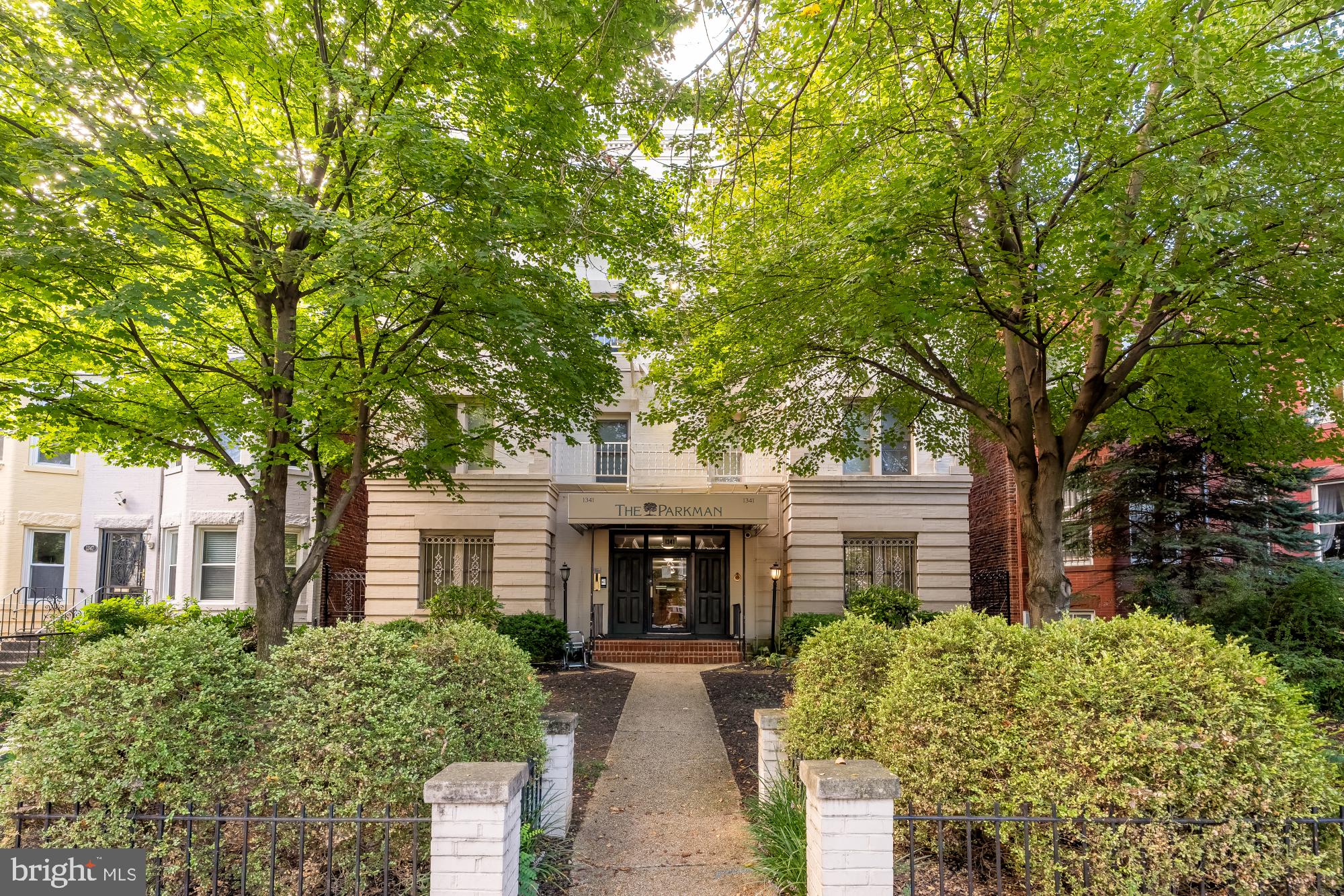 1341 East Capitol Street Southeast, Unit 107 Washington, DC 20003 - Photo 12 of 15 front view of a house with a garden