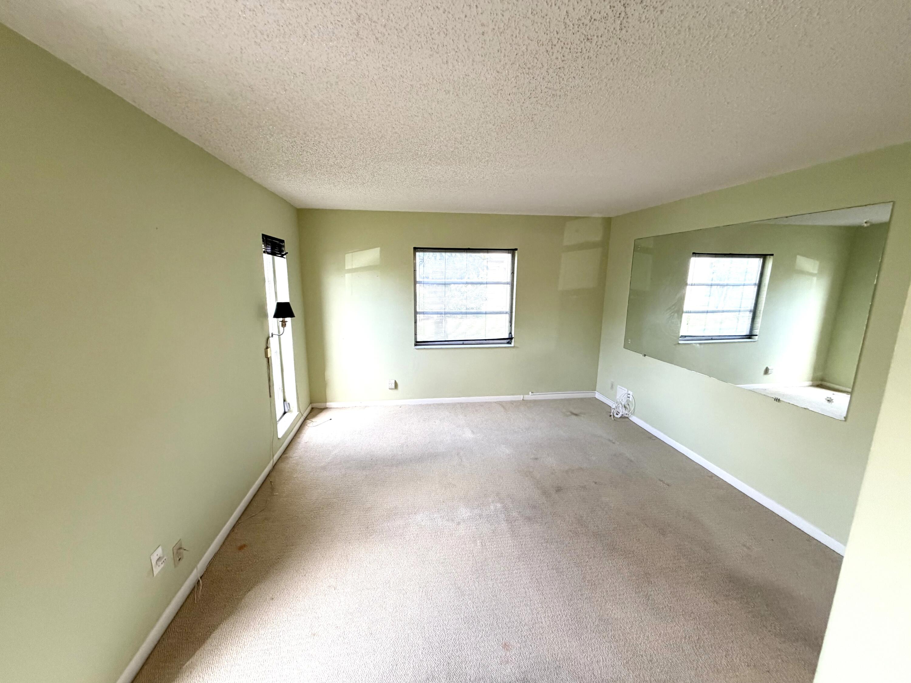1141 Violet Terrace, Unit 101 Delray Beach, FL 33445 - Photo 11 of 20 Master bedroom