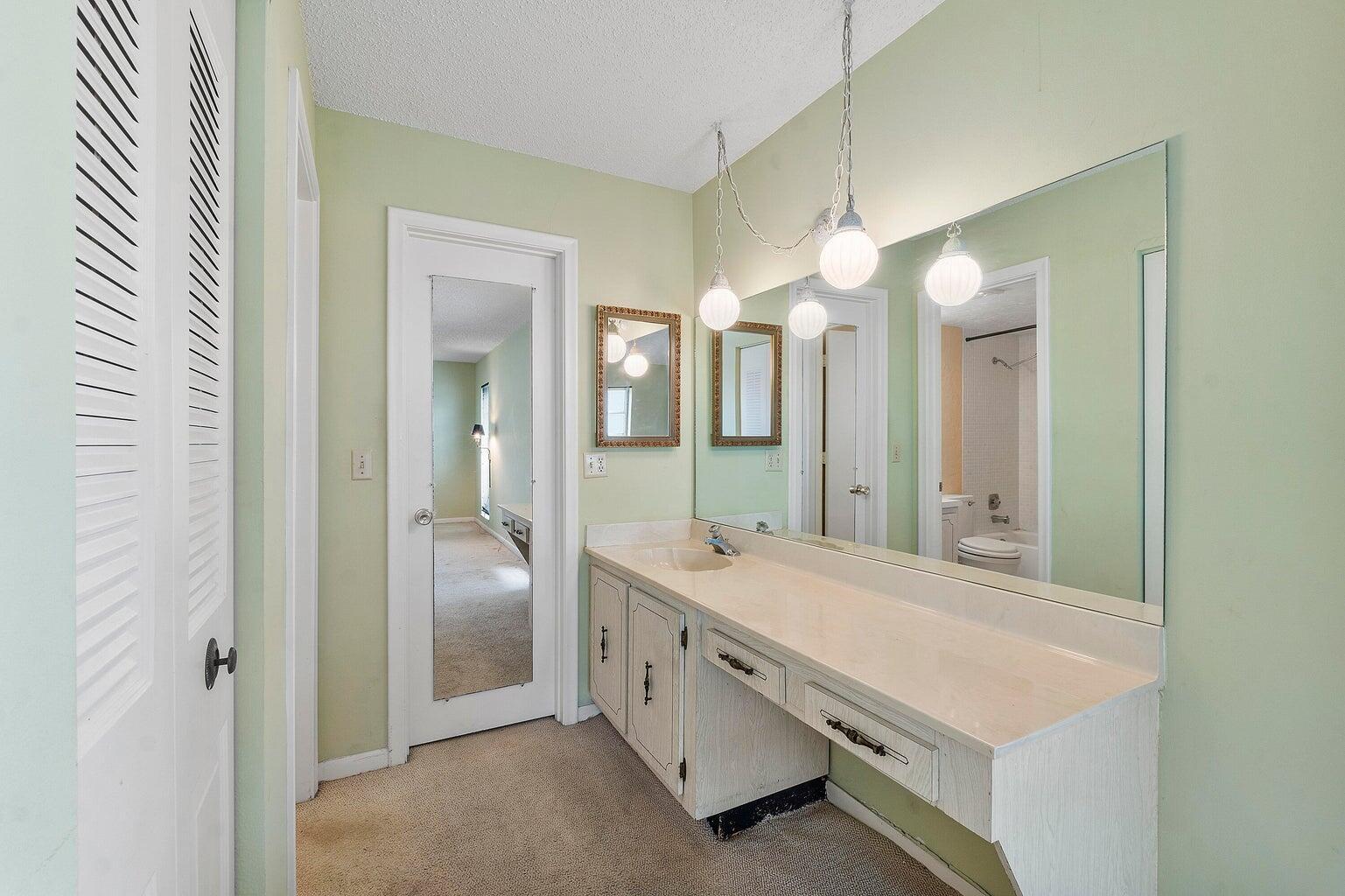 1141 Violet Terrace, Unit 101 Delray Beach, FL 33445 - Photo 12 of 20 Master dressing area