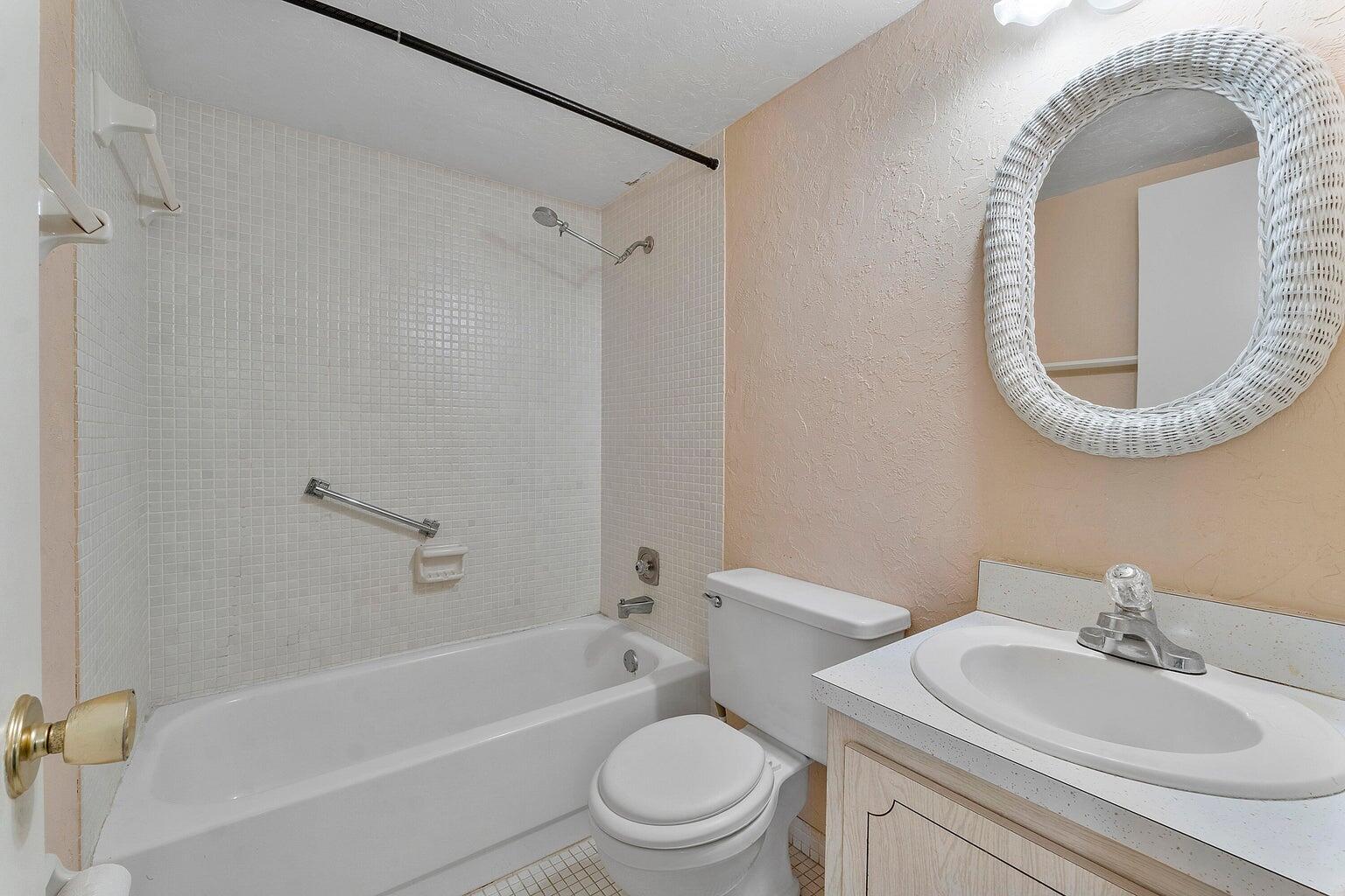 1141 Violet Terrace, Unit 101 Delray Beach, FL 33445 - Photo 13 of 20 Master bathroom