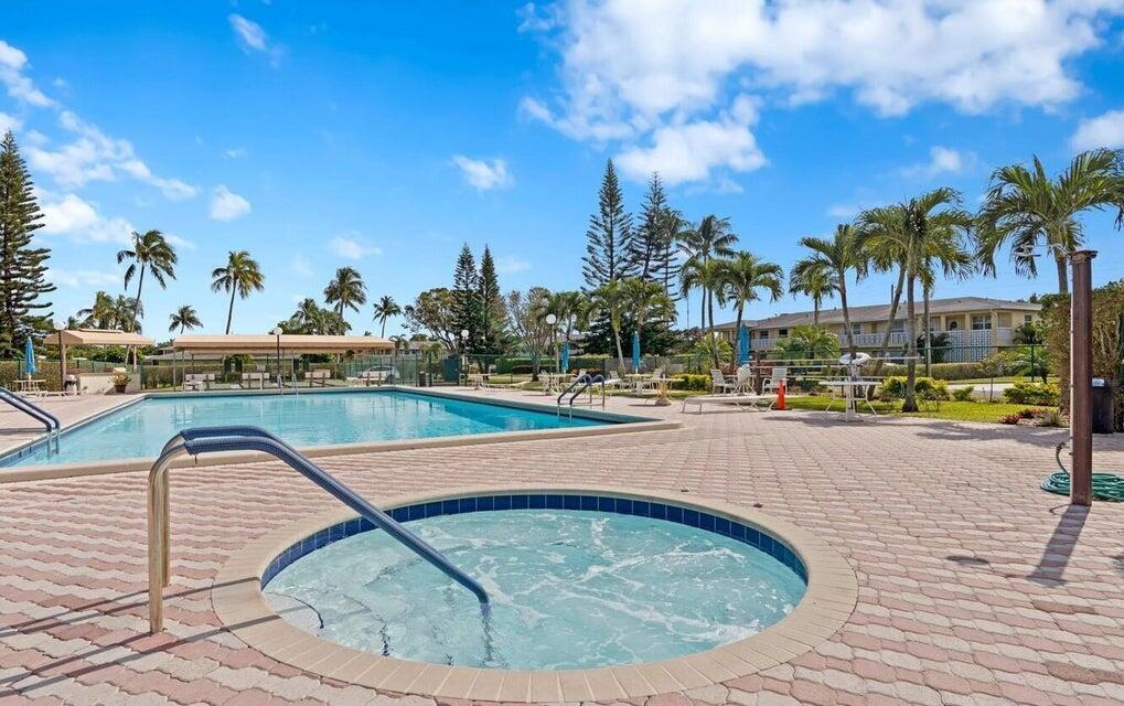 1141 Violet Terrace, Unit 101 Delray Beach, FL 33445 - Photo 15 of 20 South Club pool
