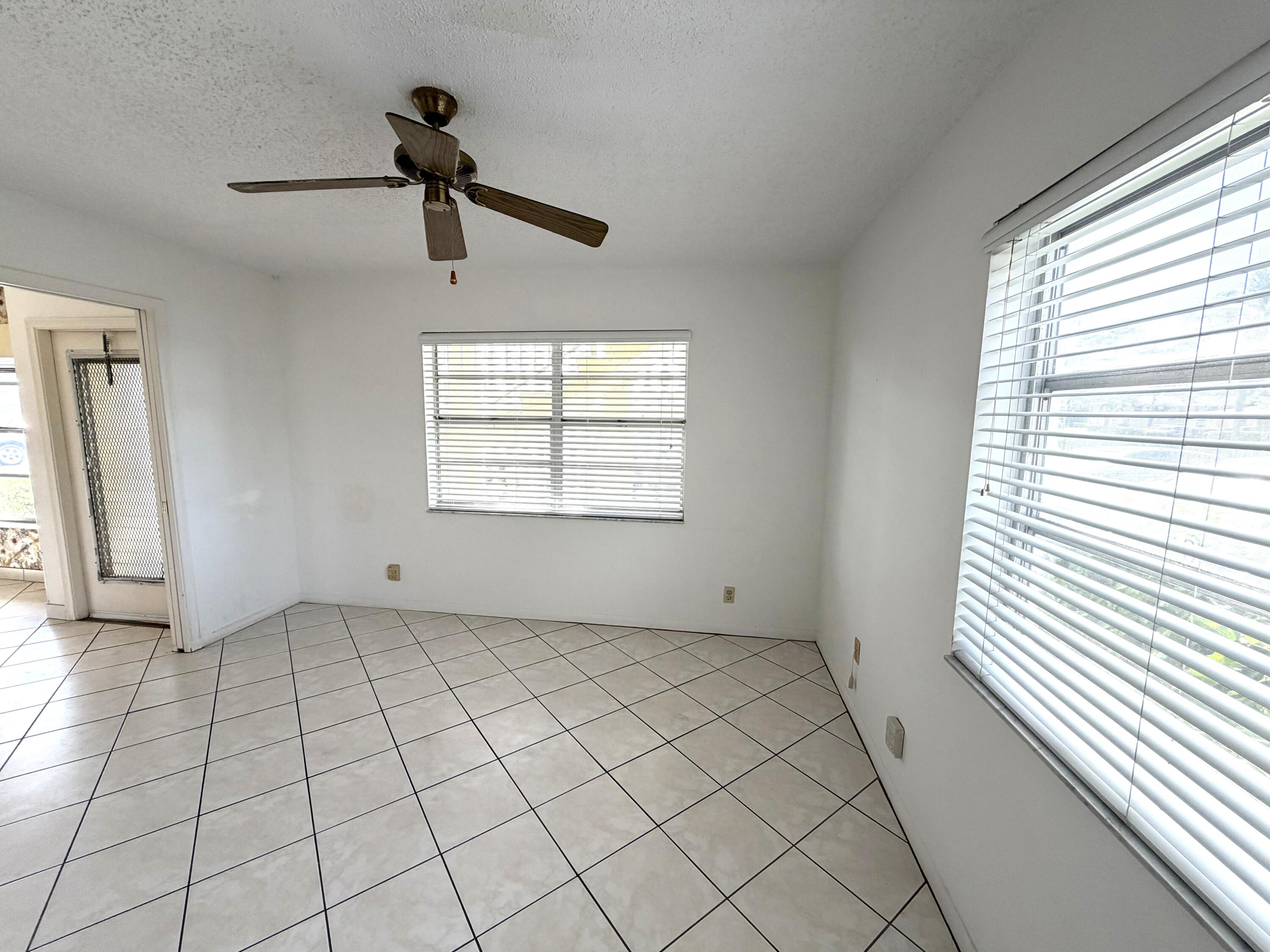 1141 Violet Terrace, Unit 101 Delray Beach, FL 33445 - Photo 8 of 20 Guest bedroom