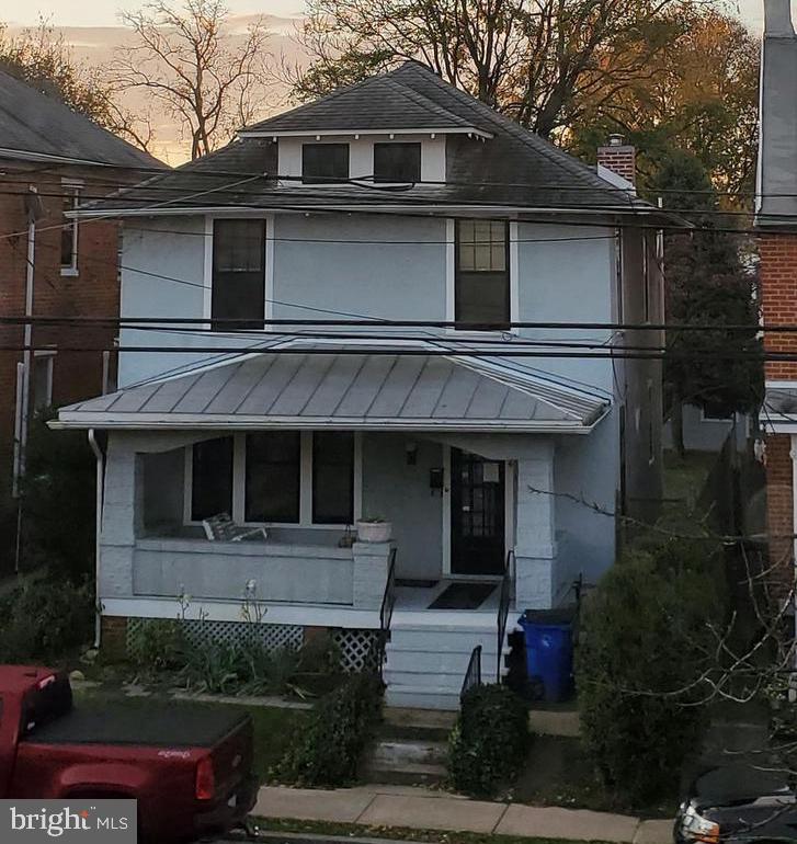 a front view of a house with garage