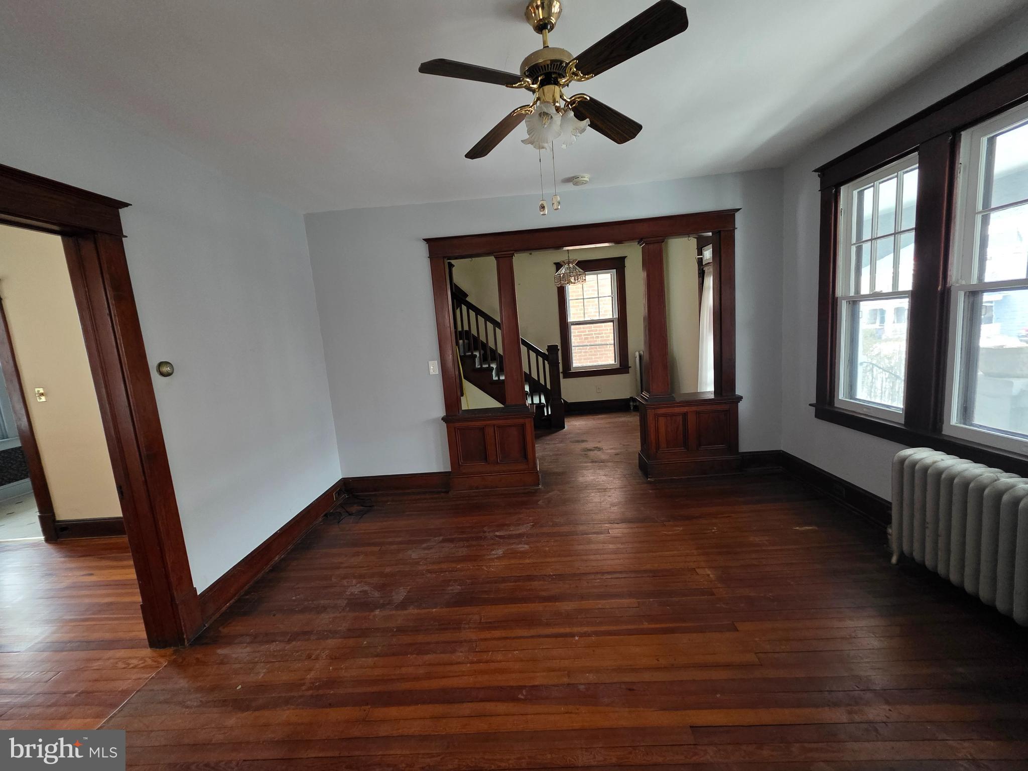 104 East 7th Street Frederick, MD 21701 - Photo 12 of 28 a view of empty room with wooden floor and fan