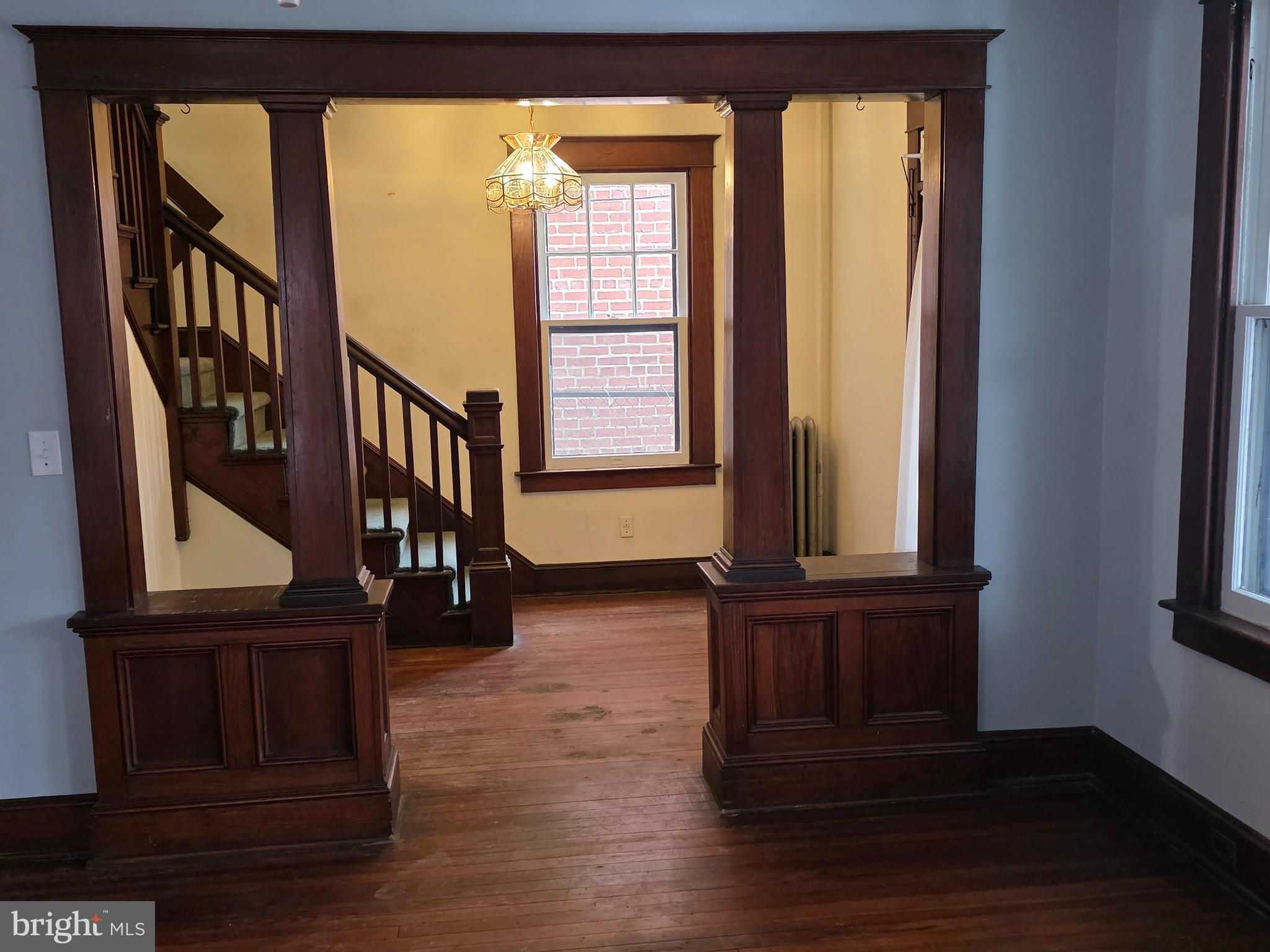 104 East 7th Street Frederick, MD 21701 - Photo 15 of 28 a view of front door with wooden floor and windows