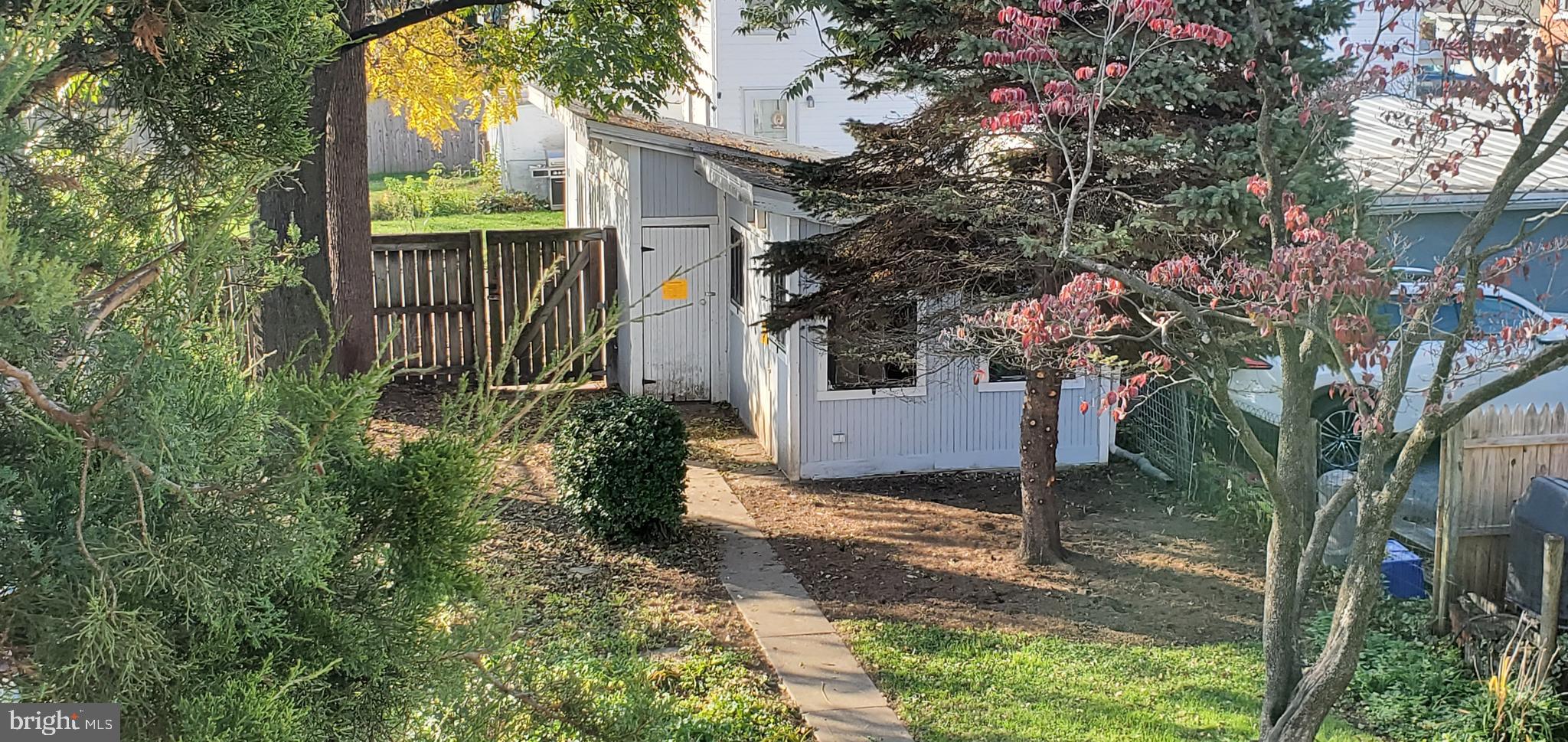 104 East 7th Street Frederick, MD 21701 - Photo 2 of 28 a view of a house with a yard and tree s