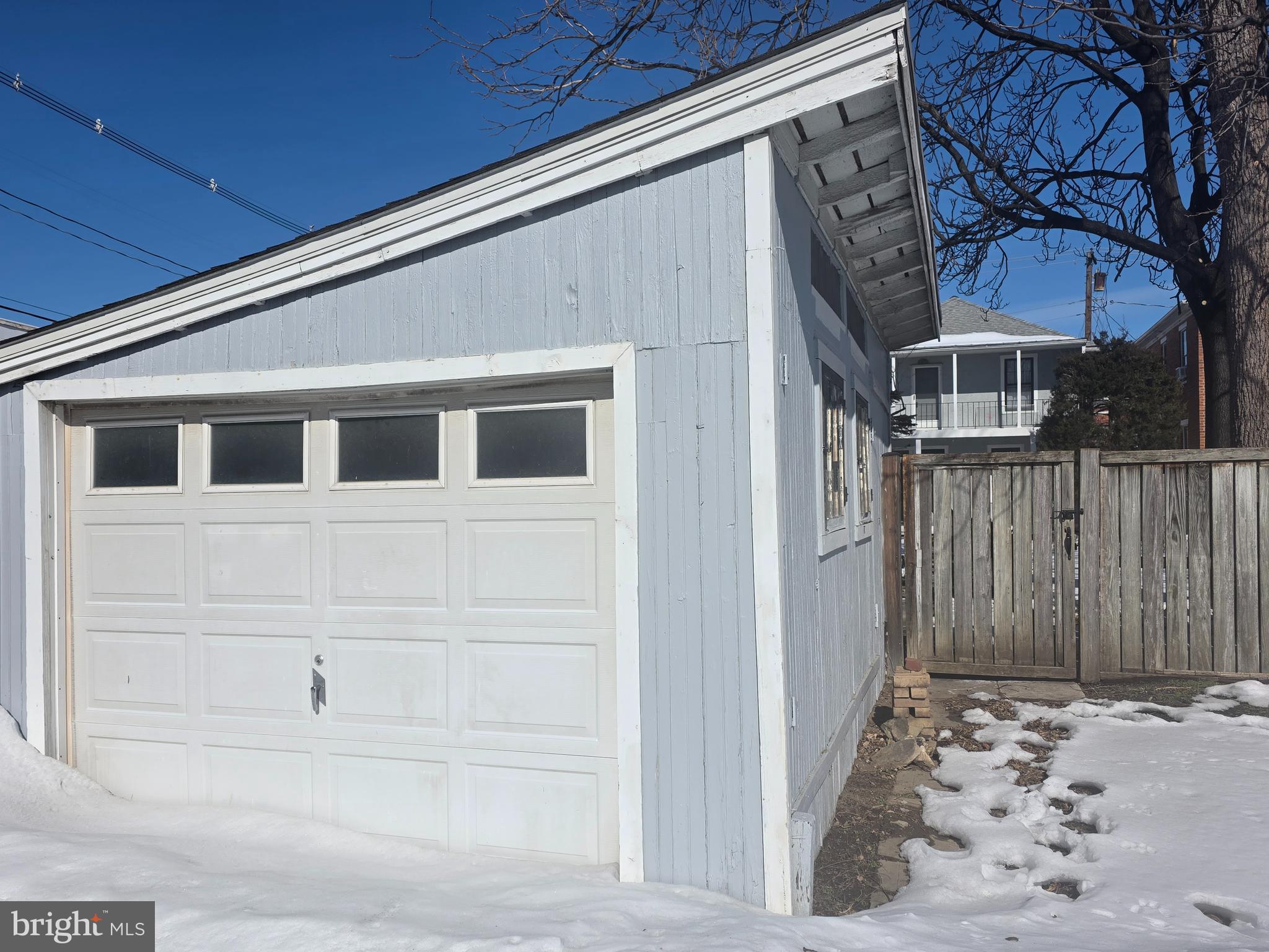 104 East 7th Street Frederick, MD 21701 - Photo 3 of 28 a view of a house with a wooden fence