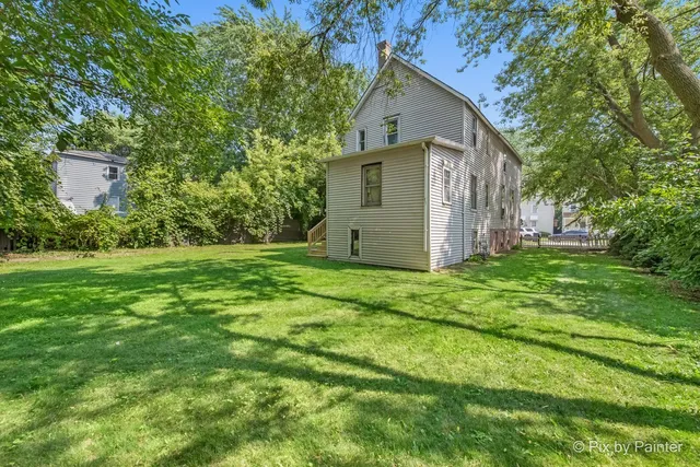 a front view of house with garden