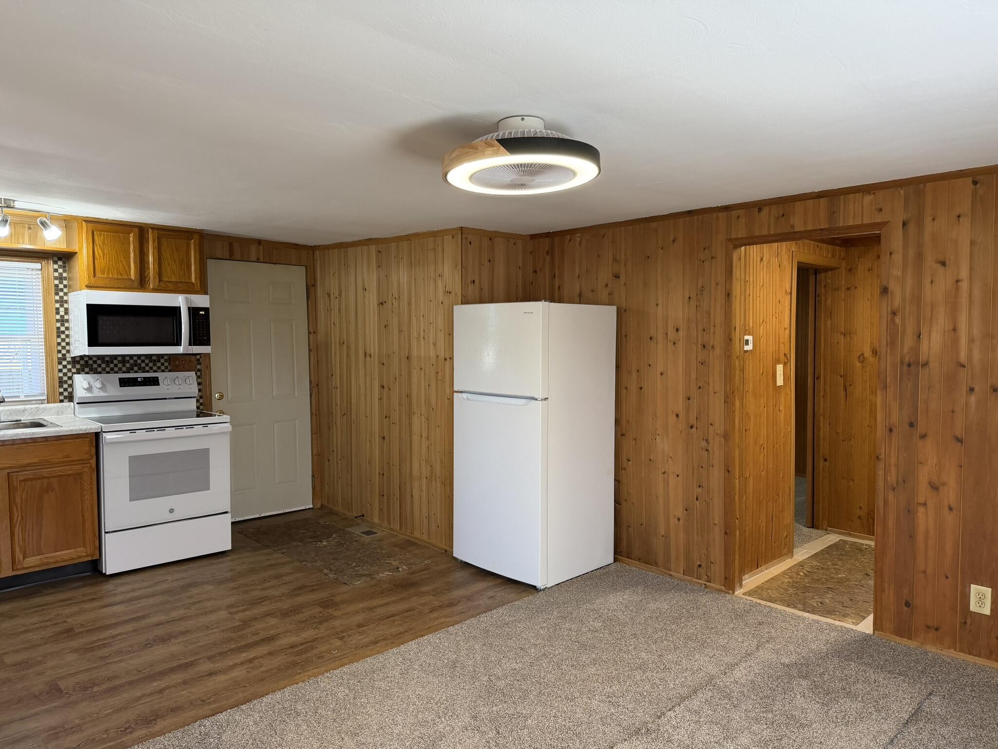 6742 Ramsey Road Hebron, IN 46341 - Photo 18 of 30 a view of a kitchen with a sink and a refrigerator