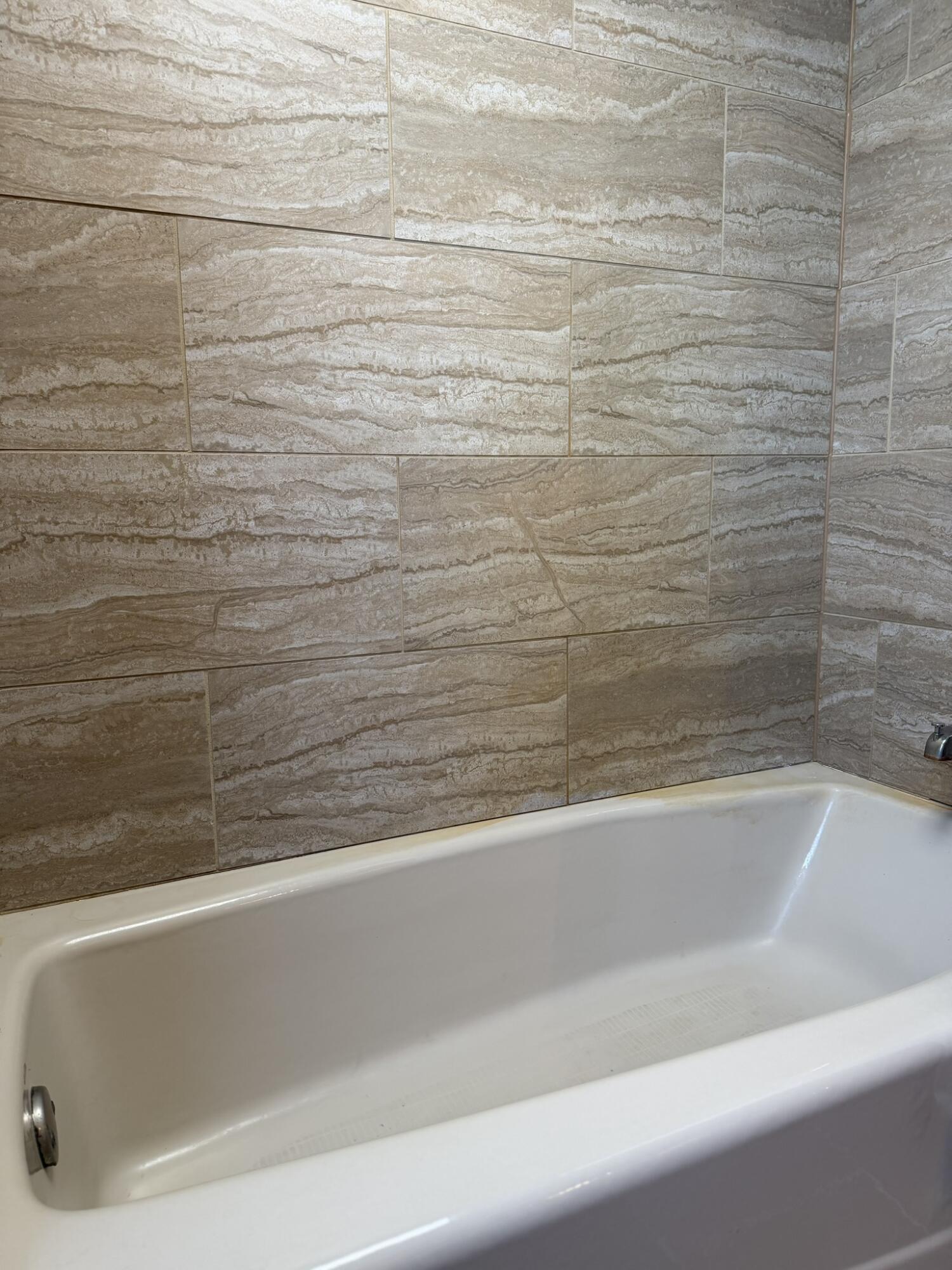 6742 Ramsey Road Hebron, IN 46341 - Photo 26 of 30 a bathroom with a bathtub