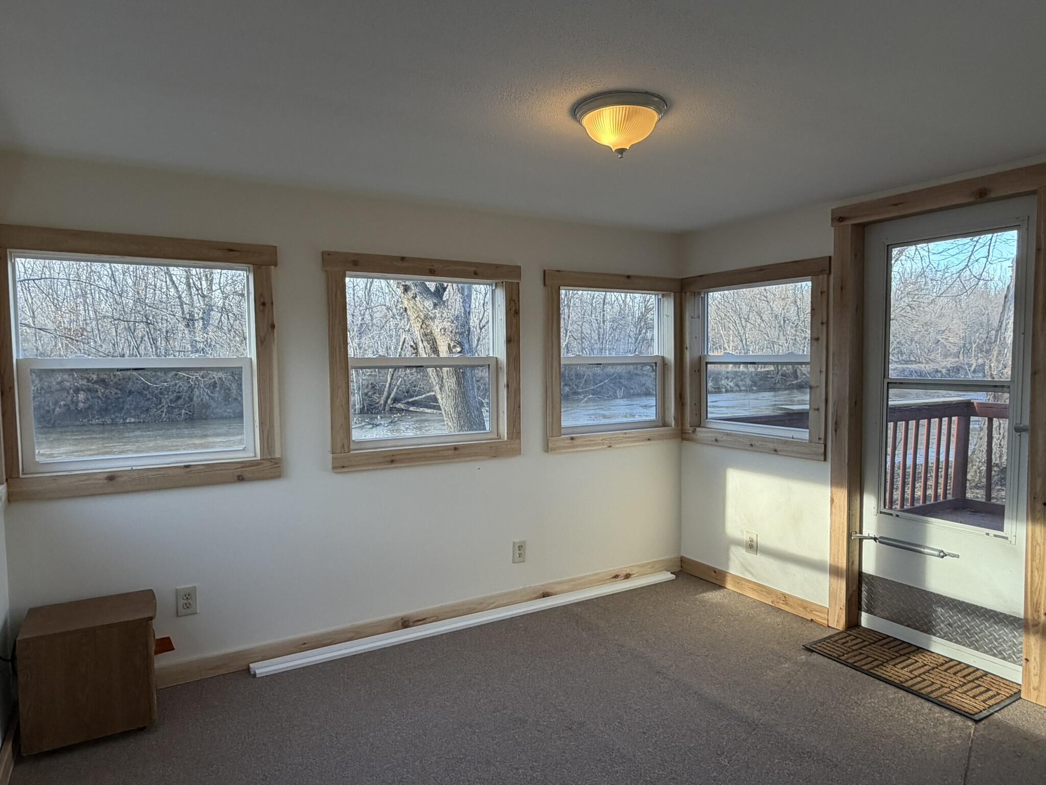 6742 Ramsey Road Hebron, IN 46341 - Photo 30 of 30 an empty room with a empty space and windows