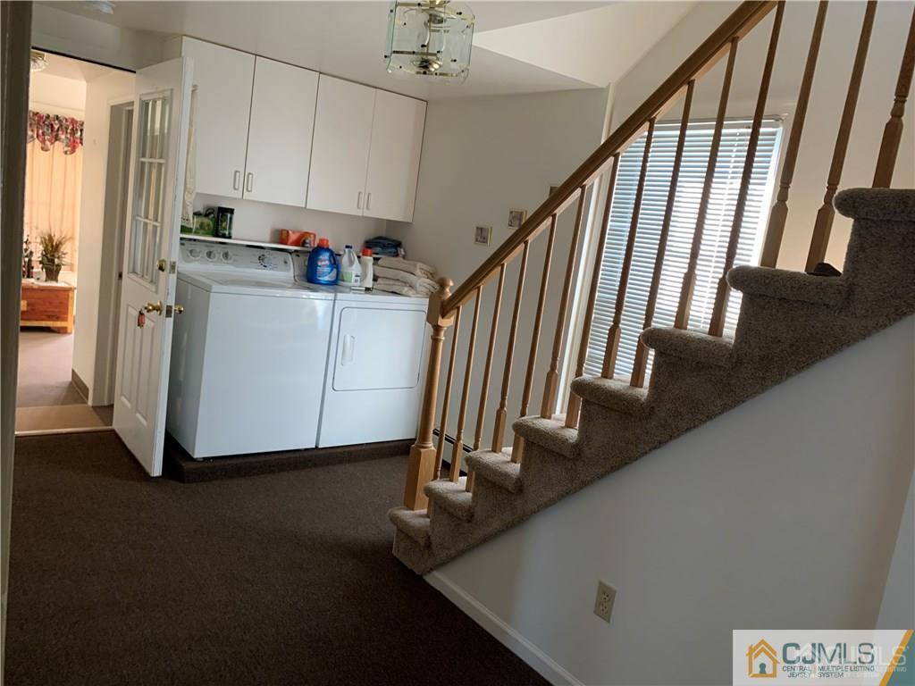 519 A Morristown Road, Unit A Old Bridge, NJ 07747 - Photo 2 of 17 a view of a hallway with staircase