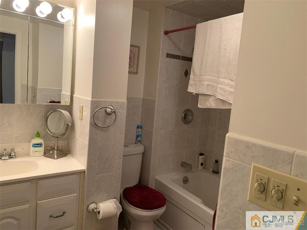 519 A Morristown Road, Unit A Old Bridge, NJ 07747 - Photo 8 of 17 a bathroom with a sink toilet and shower
