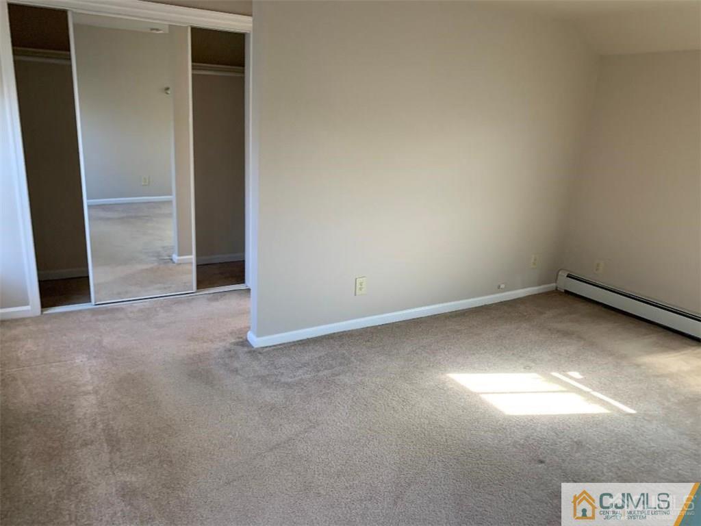 519 A Morristown Road, Unit A Old Bridge, NJ 07747 - Photo 10 of 17 an empty room with a empty space