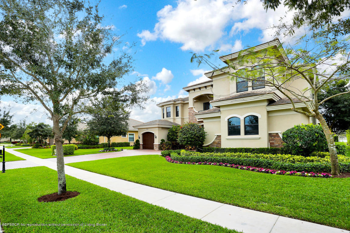 9831 Equus Circle Boynton Beach, FL 33472 - Photo 13 of 44 a front view of house with yard and green space