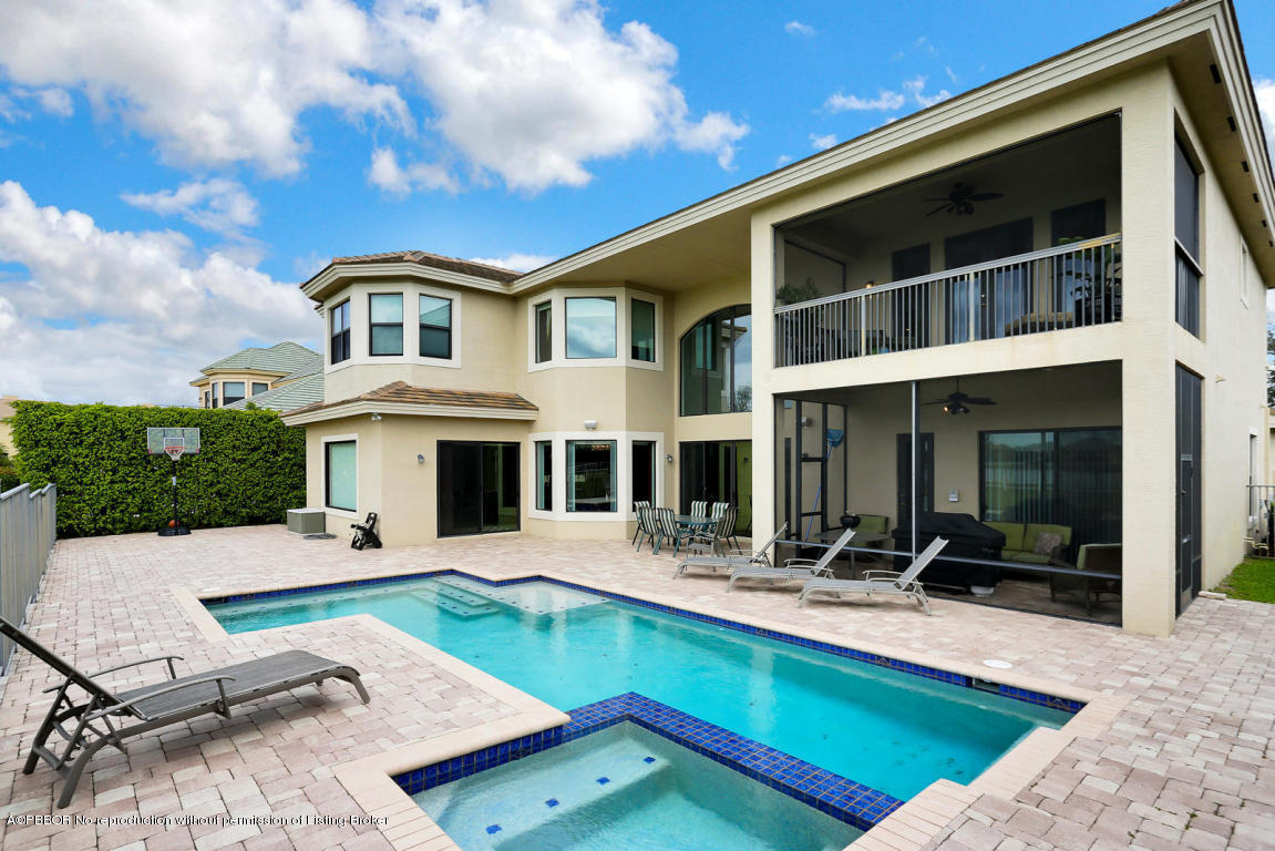 9831 Equus Circle Boynton Beach, FL 33472 - Photo 14 of 44 a view of house with swimming pool and patio