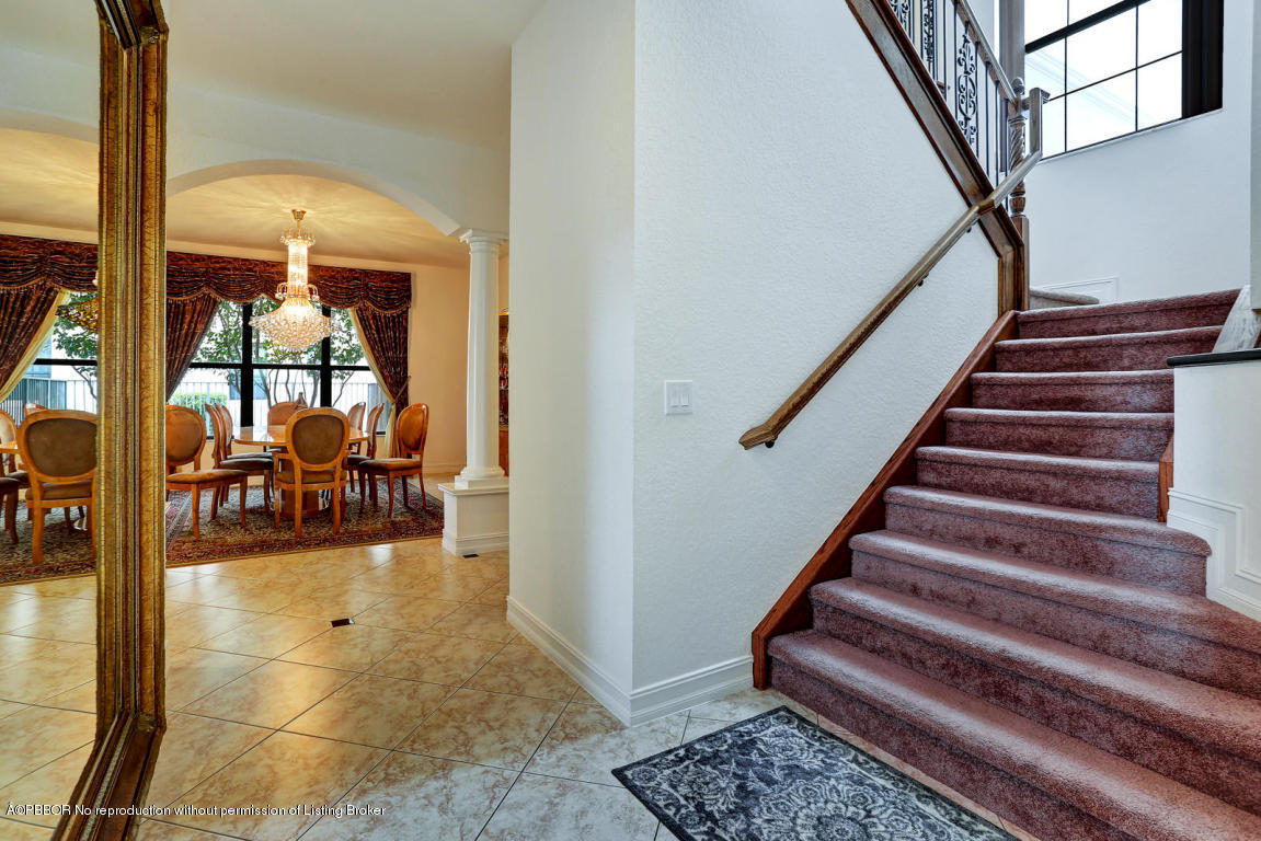 9831 Equus Circle Boynton Beach, FL 33472 - Photo 34 of 44 a view of entryway and hall with dining room