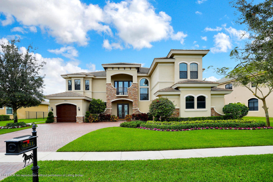 9831 Equus Circle Boynton Beach, FL 33472 - Photo 35 of 44 a front view of a house with a yard