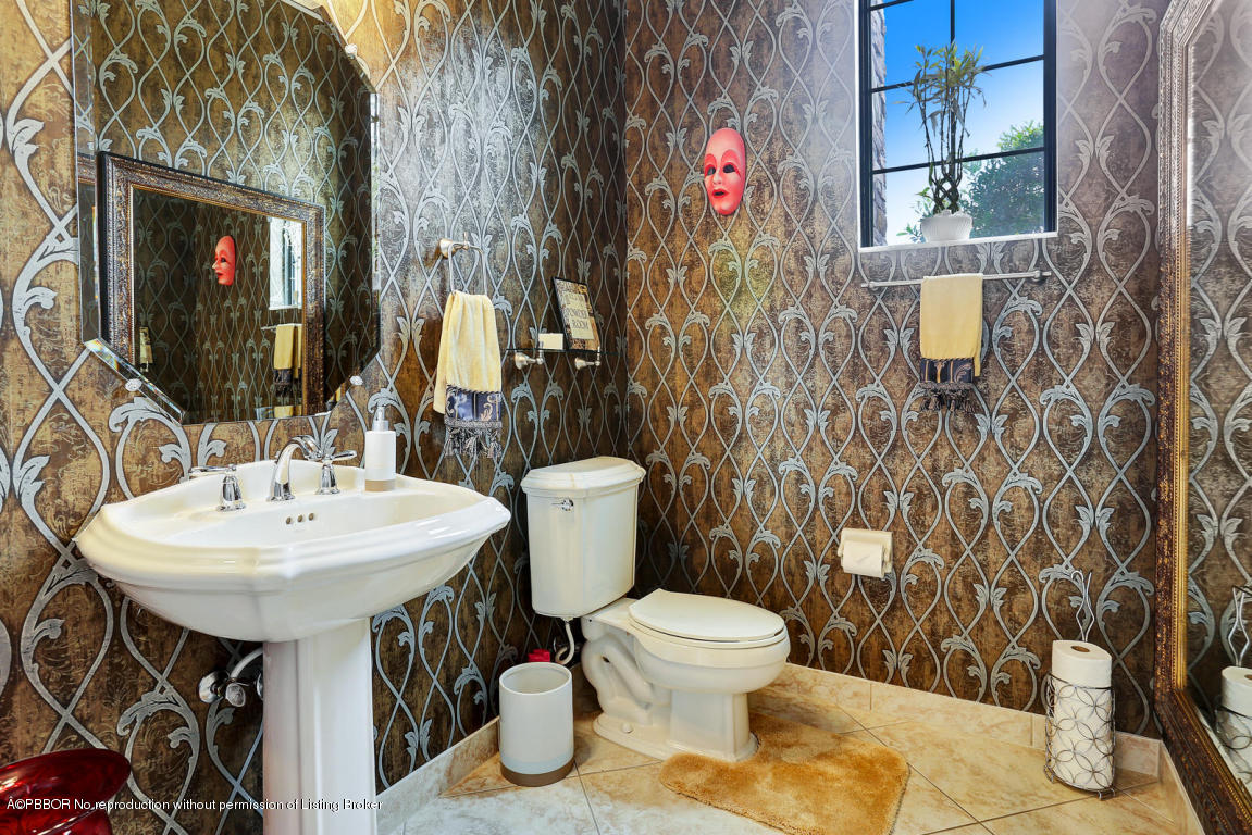 9831 Equus Circle Boynton Beach, FL 33472 - Photo 39 of 44 a bathroom with a sink toilet and shower