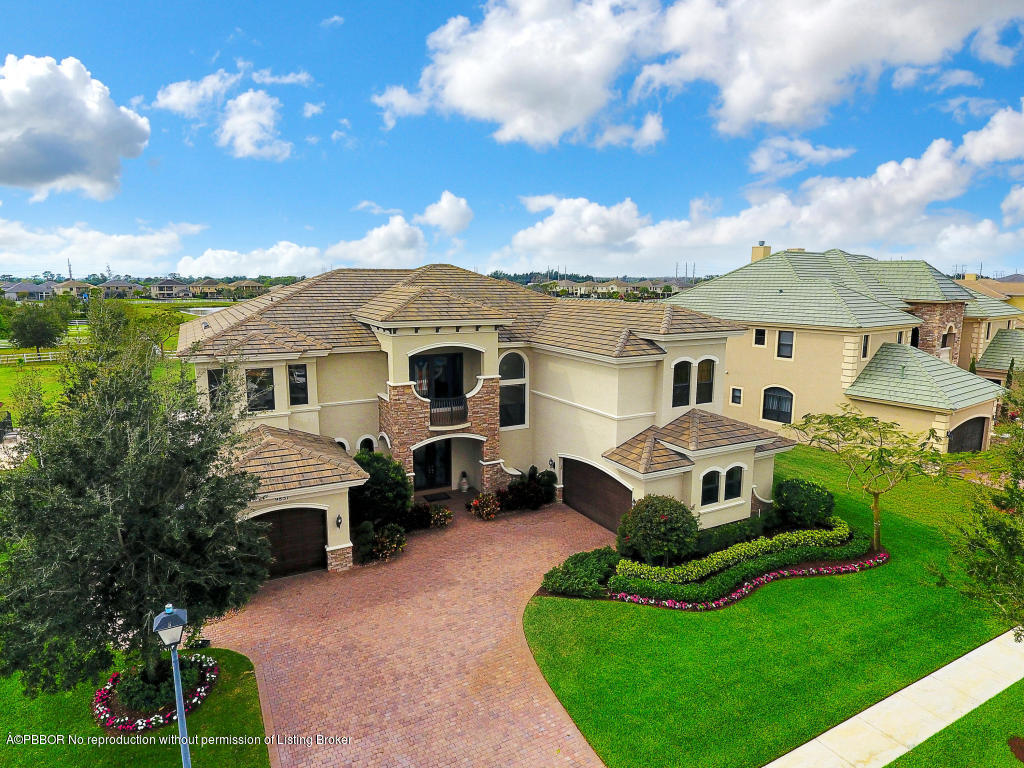 9831 Equus Circle Boynton Beach, FL 33472 - Photo 41 of 44 a front view of a house with garden