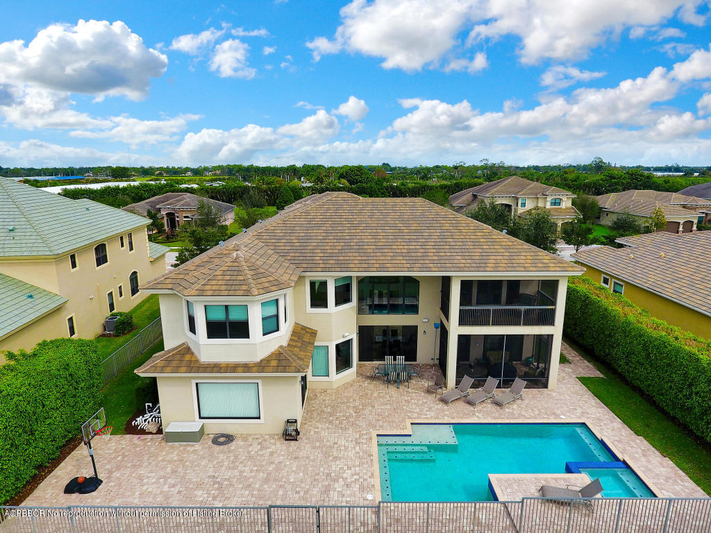 9831 Equus Circle Boynton Beach, FL 33472 - Photo 43 of 44 an aerial view of a house with swimming pool and garden