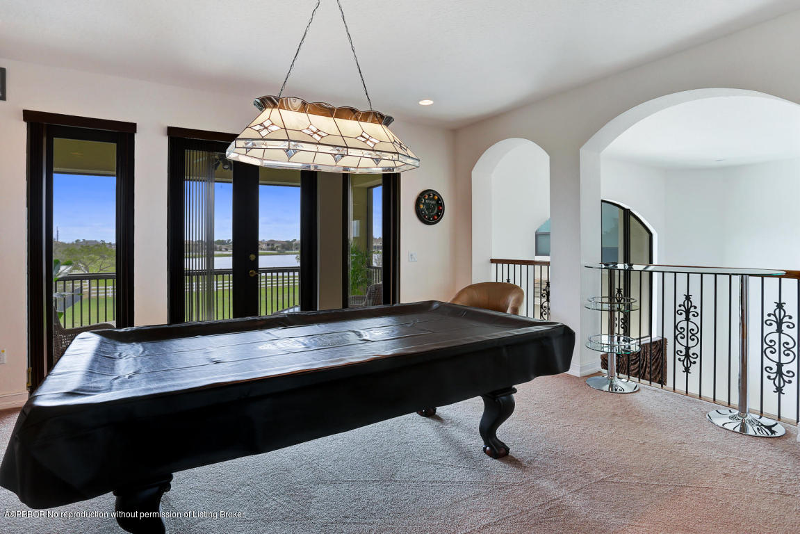 9831 Equus Circle Boynton Beach, FL 33472 - Photo 7 of 44 a view of a room with a table and chairs