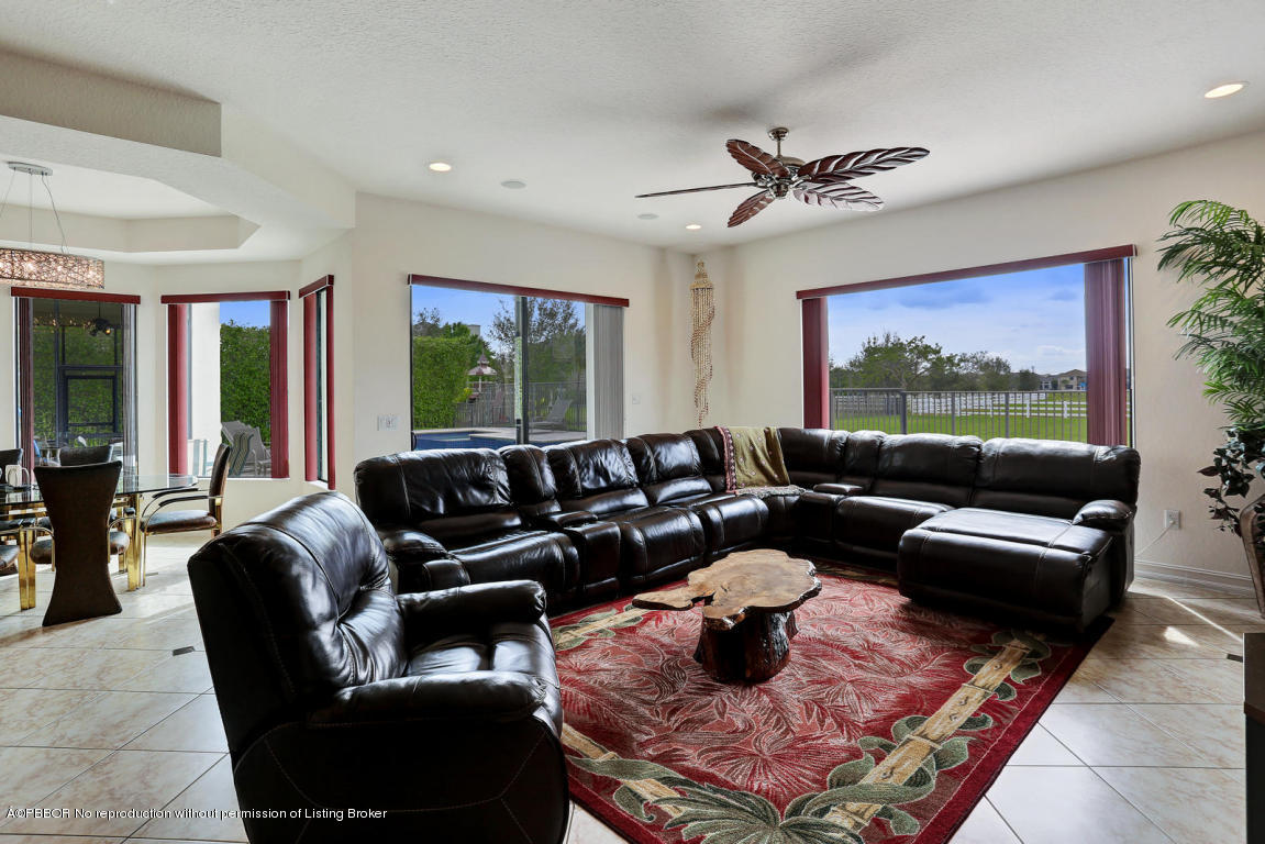9831 Equus Circle Boynton Beach, FL 33472 - Photo 8 of 44 a living room with furniture and a rug