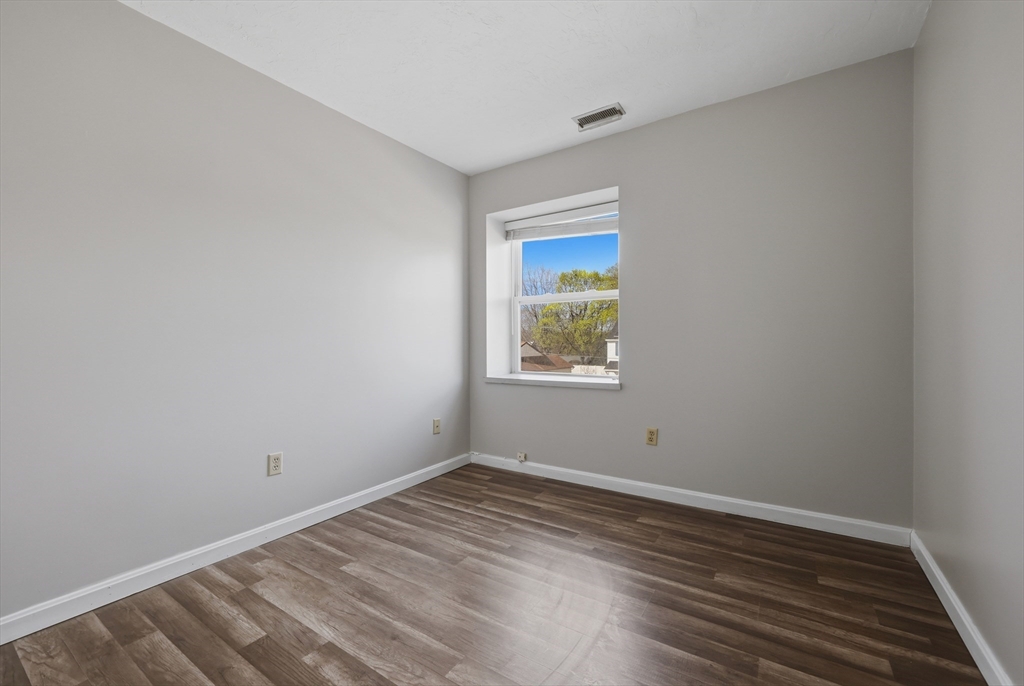 21 Middlesex Avenue, Unit 305 Worcester, MA 01604 - Photo 19 of 27 an empty room with a window