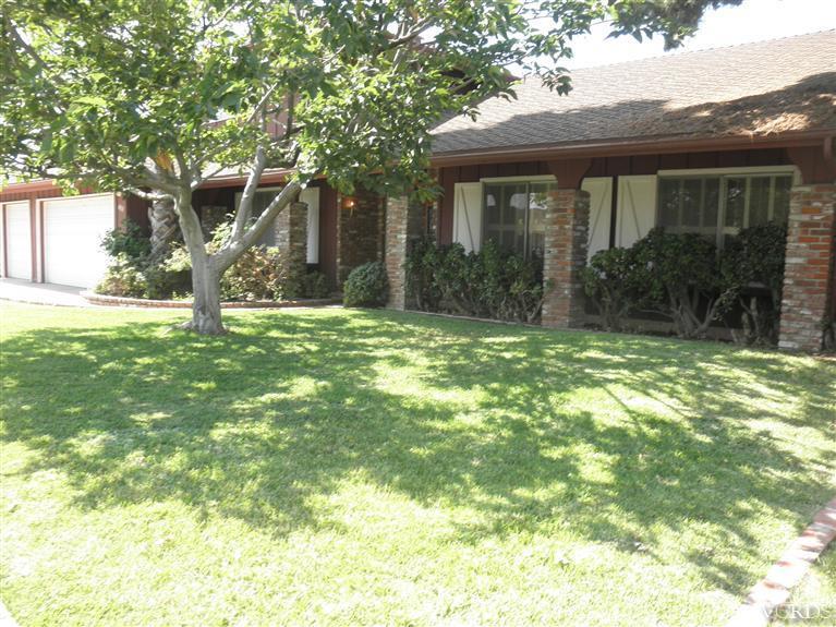 4181 Springfield Street Simi Valley, CA 93063 - Photo 3 of 13 a white house that has tree in front of it