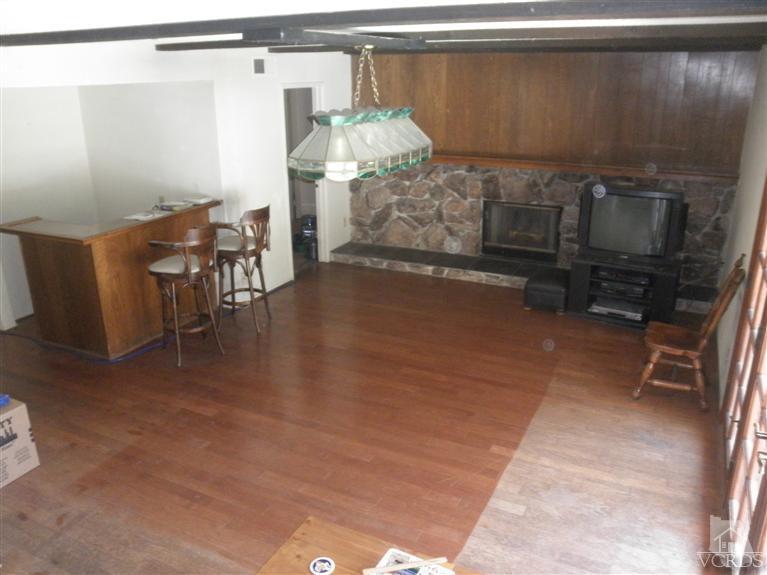 4181 Springfield Street Simi Valley, CA 93063 - Photo 6 of 13 a dining room with furniture and a flat screen tv