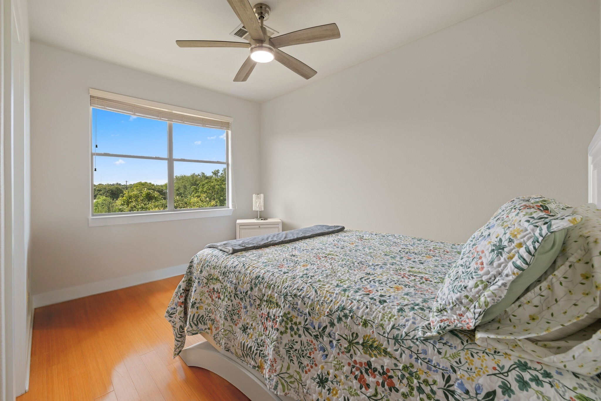 13420 Lyndhurst Street, Unit 806 Austin, TX 78717 - Photo 11 of 24 a bedroom with a bed and a window