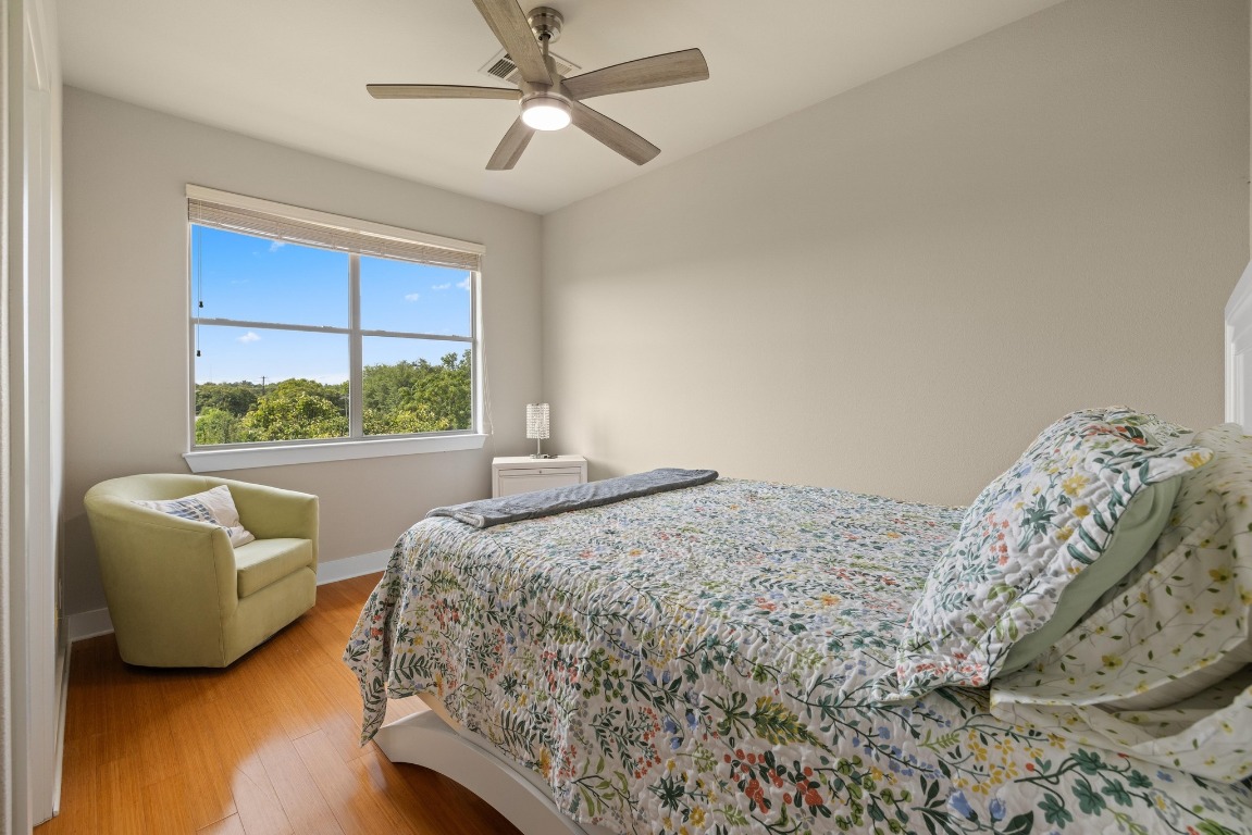 13420 Lyndhurst Street, Unit 806 Austin, TX 78717 - Photo 8 of 23 a bedroom with a bed and a window