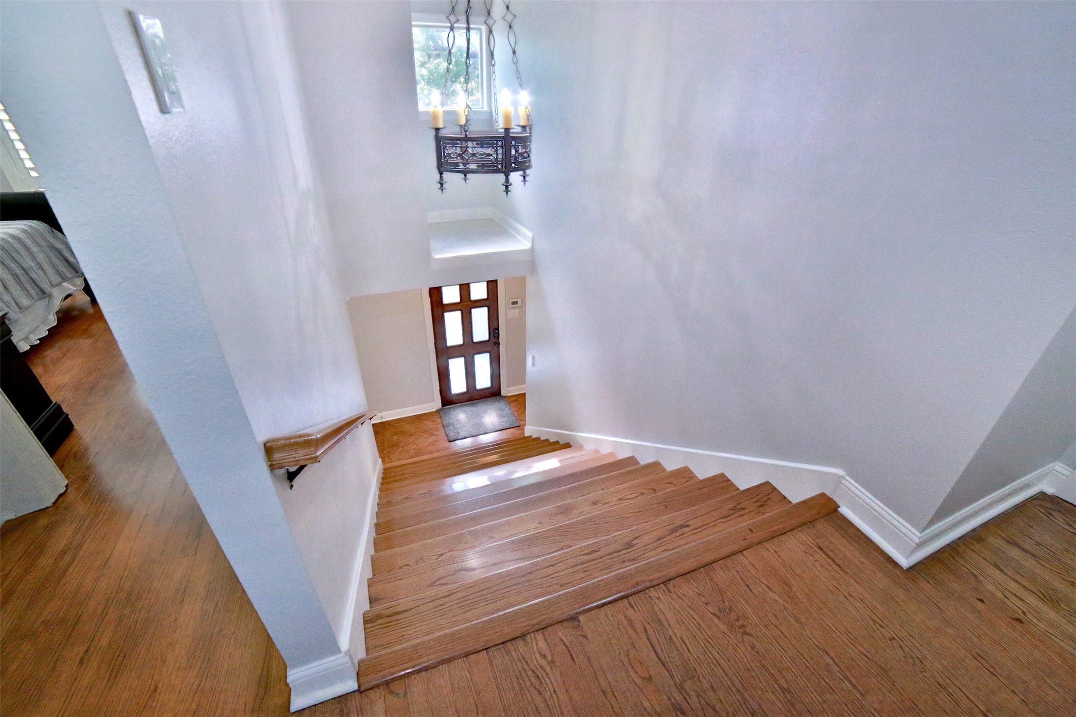 2625 Peckham Street Houston, TX 77098 - Photo 13 of 27 a view of a livingroom with wooden floor and staircase