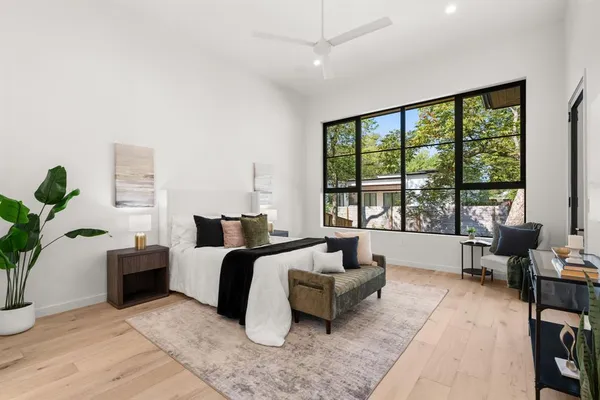 a bed room with a bed and a couch