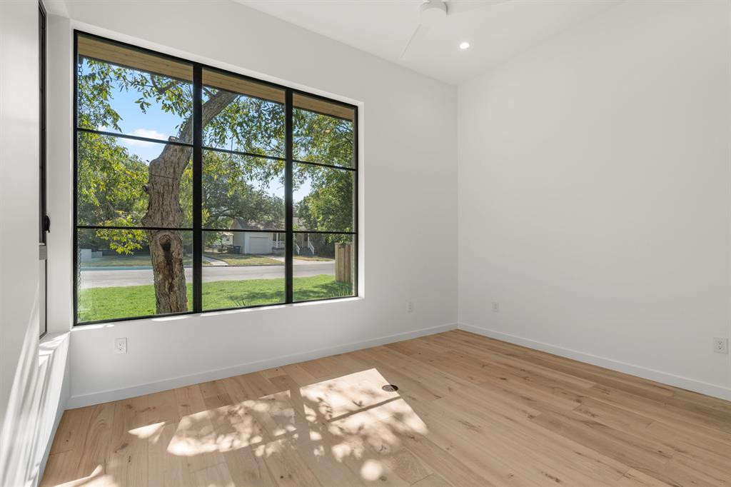 5908 Bull Creek Road Austin, TX 78757 - Photo 21 of 36 a view of a room with a large window