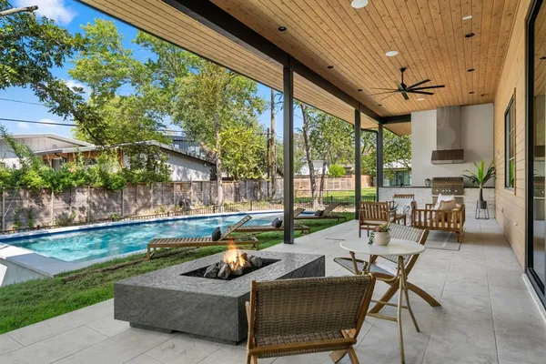 a outdoor space with patio lots of furniture and garden