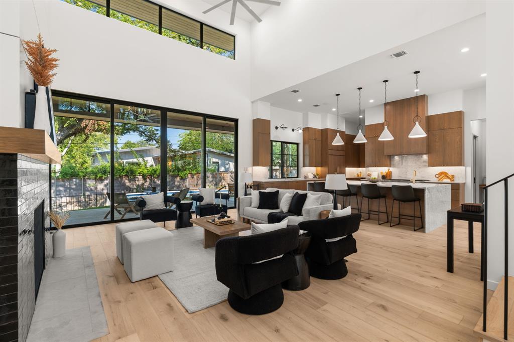 5908 Bull Creek Road Austin, TX 78757 - Photo 4 of 36 a living room with furniture and a large window