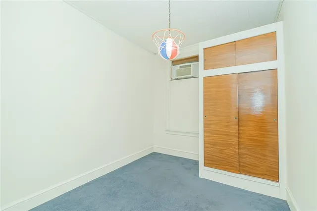 an empty room with window