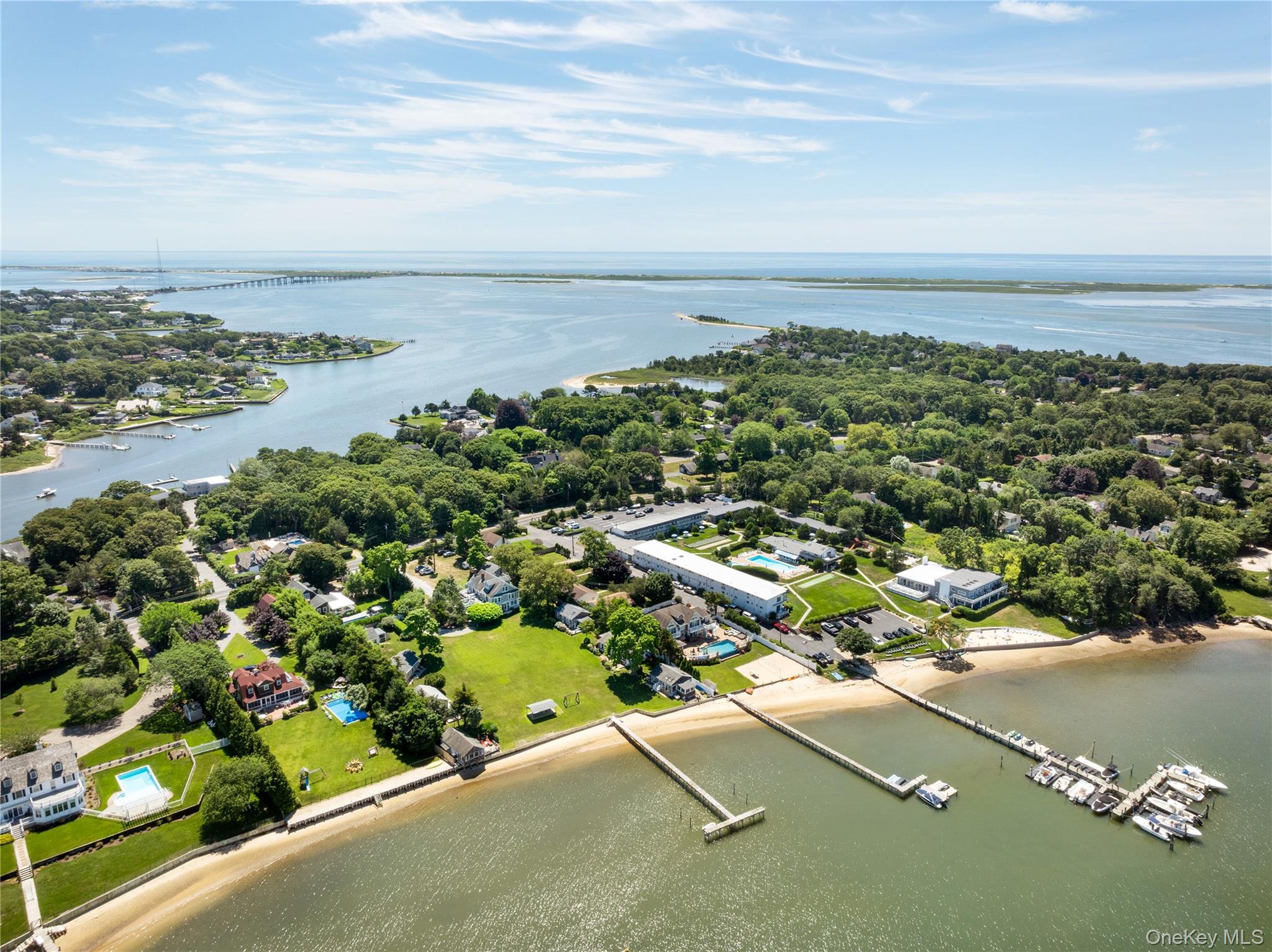 46 Rampasture Road, Unit 3 Hampton Bays, NY 11946 - Photo 23 of 29 an aerial view of a city