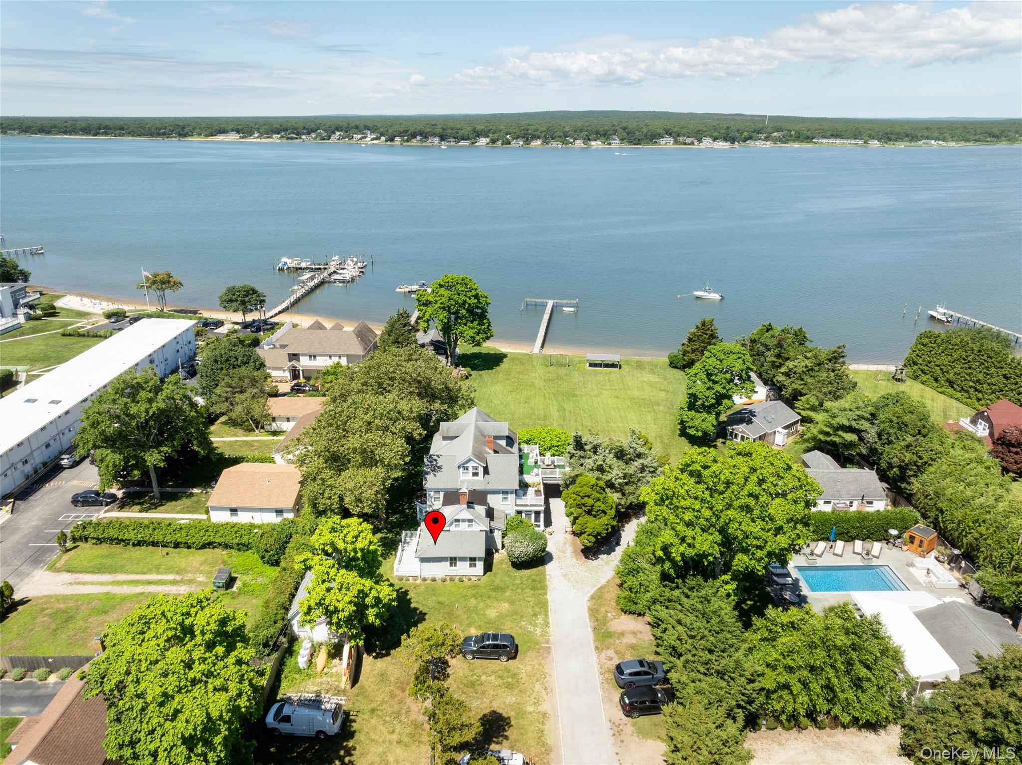 46 Rampasture Road, Unit 3 Hampton Bays, NY 11946 - Photo 4 of 29 a view of a lake with a lake view
