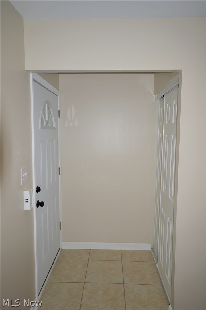 6468 Sherborn Road Parma Heights, OH 44130 - Photo 22 of 26 Front entryway with ceramic tile and new doors!